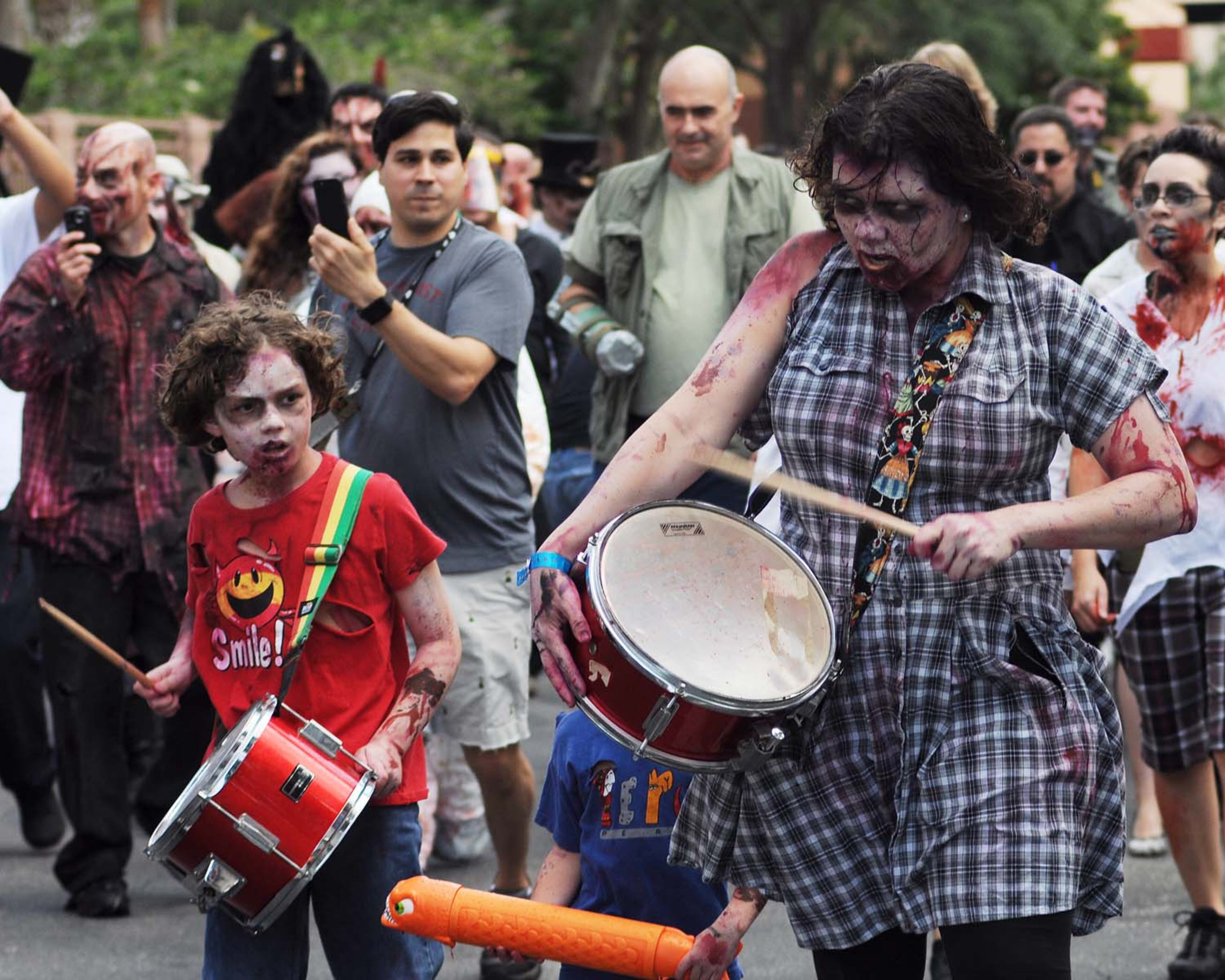 A pack of blood-thirsty zombies marched on the Rosen Centre Hotel in Orlando, Florida to kick off Spooky Empire's annual May-Hem horror convention.