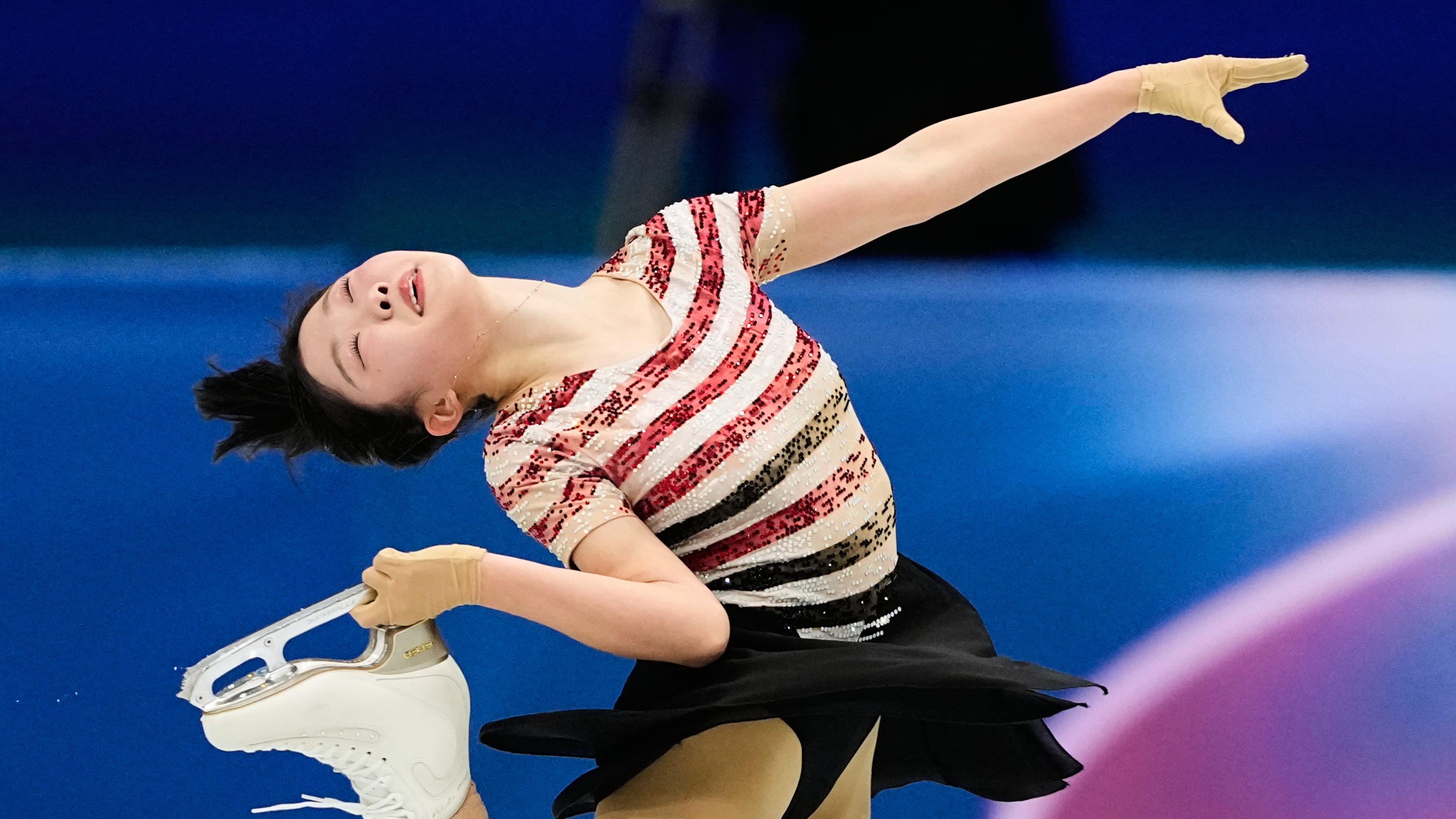 Ami Nakai of Japan competes during the women's short program figure skating at the 2026 Winter Olympics, in Milan, Italy, Tuesday, Feb. 17, 2026. (AP Photo/Natacha Pisarenko)