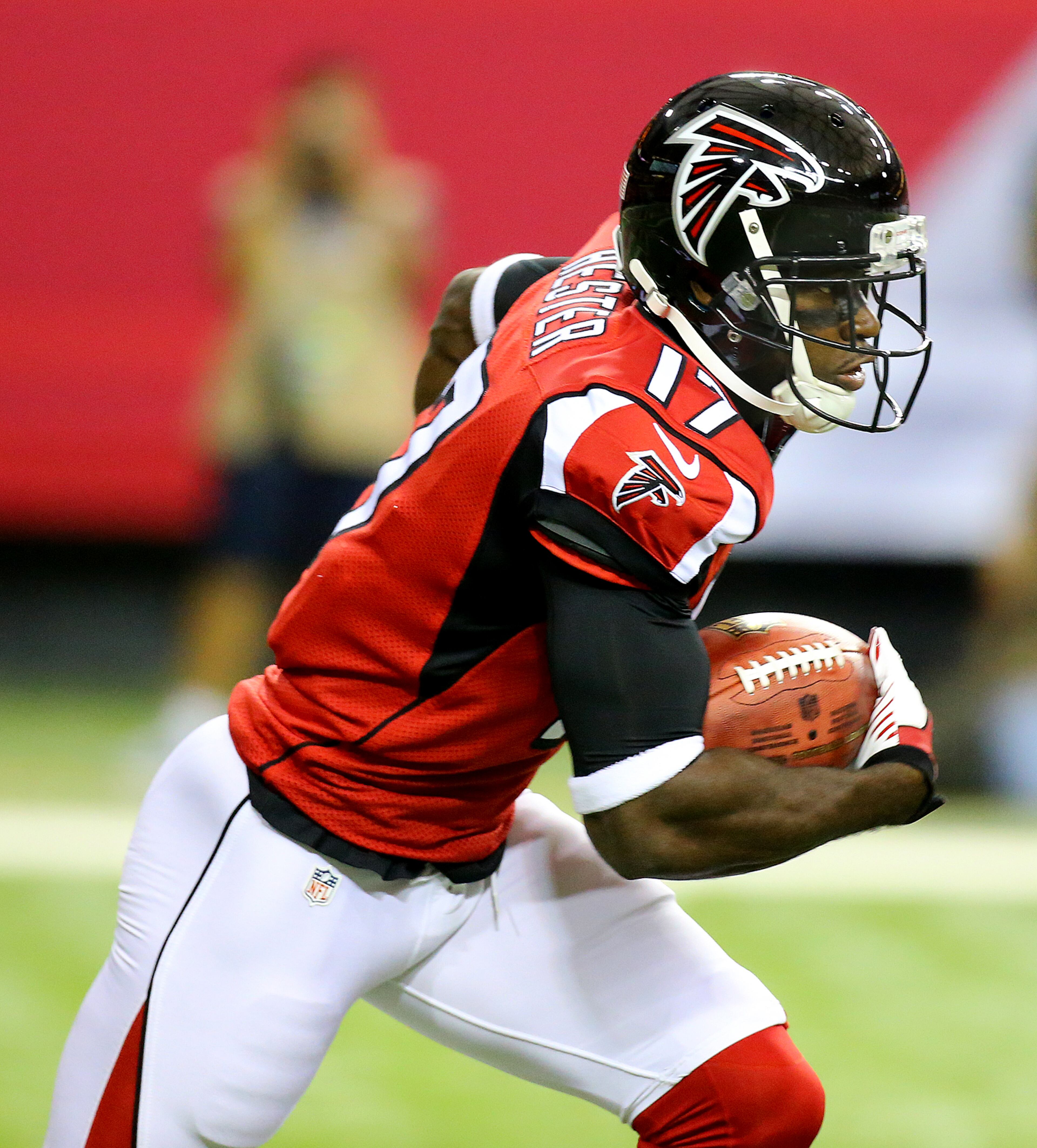 Falcons wide receiver Devin Hester returns a punt during an NFL exhibition game against Miami on Friday, August 8, 2014, in Atlanta.