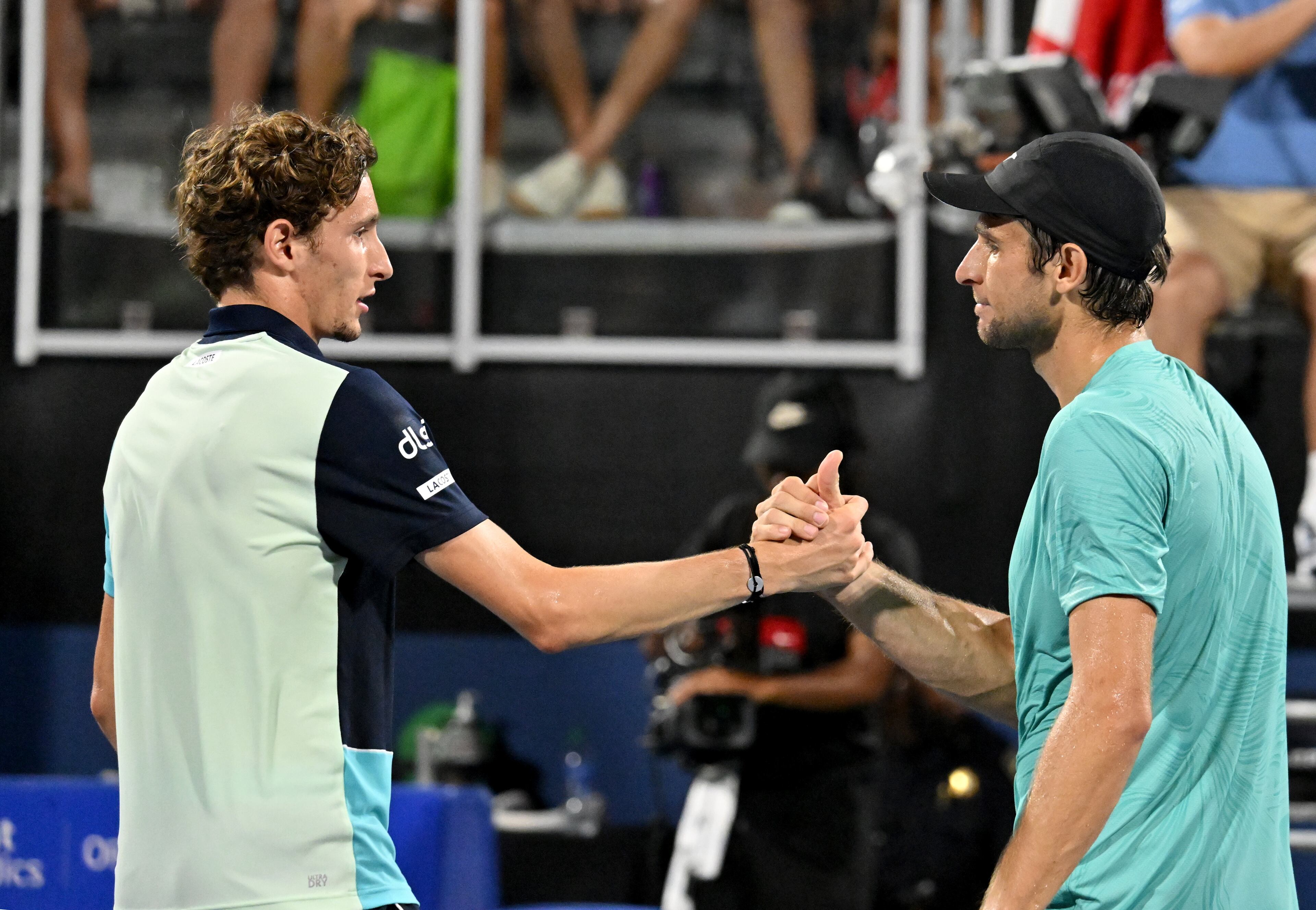 Aleksandar Vukic (right) and Ugo Humbert shake hands after Vukic beat Humbert during a semifinal match at the 2023 Atlanta Tennis Open at Atlantic Station, Saturday, July 29, 2023, in Atlanta. (Hyosub Shin / Hyosub.Shin@ajc.com)