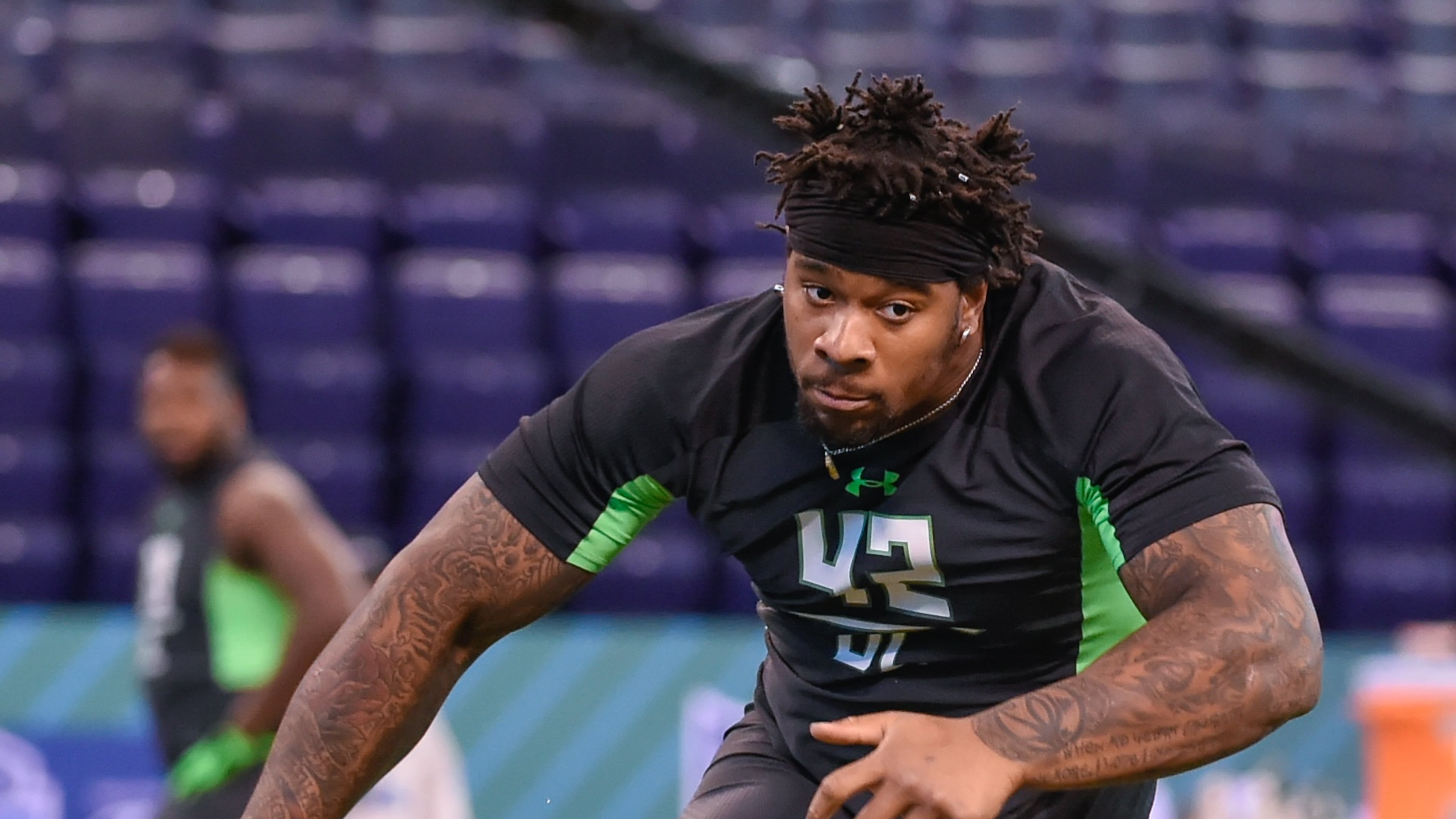 Mississippi defensive lineman Robert Nkemdiche runs a drill at the NFL football scouting combine, Sunday, Feb. 28, 2016, in Indianapolis. (AP Photo/L.G. Patterson)