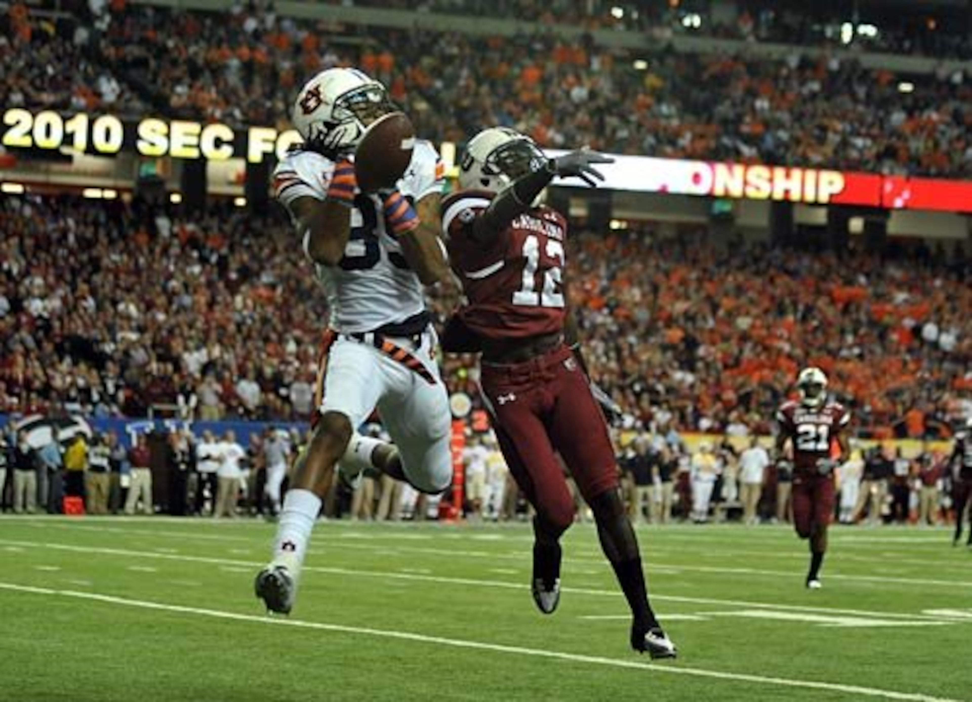 South Carolina Gamecocks cornerback C.C. Whitlock (12) breaks up a pass intended for Auburn Tigers wide receiver Darvin Adams (89) during the first half of the SEC Championship.