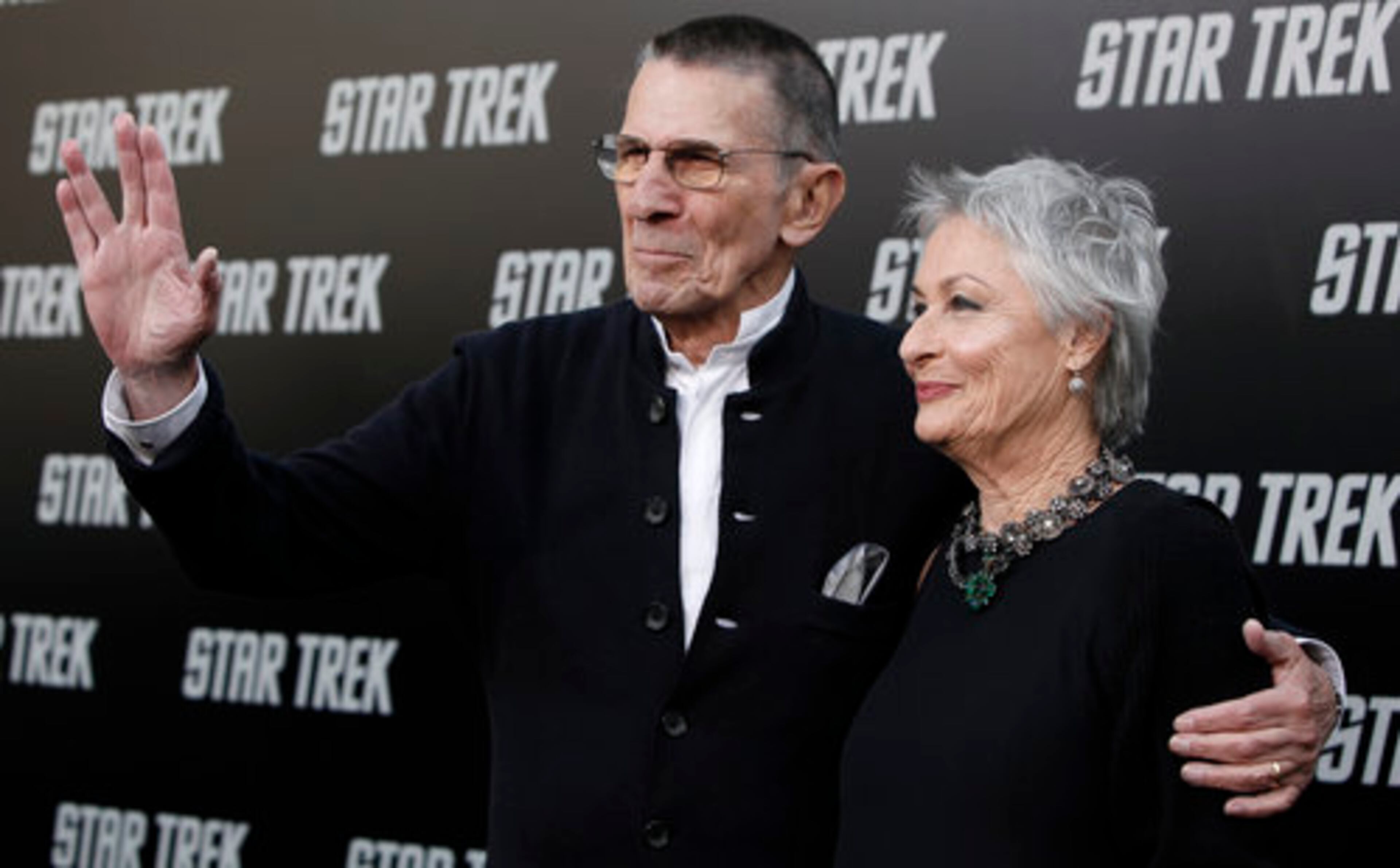 THE ORIGINAL Spock, Leonard Nimoy, reprises his old character in the new film. Here, seen with his wife Susan Bay, Nimoy delivers the Vulcan salute. The new movie opens May 8.
