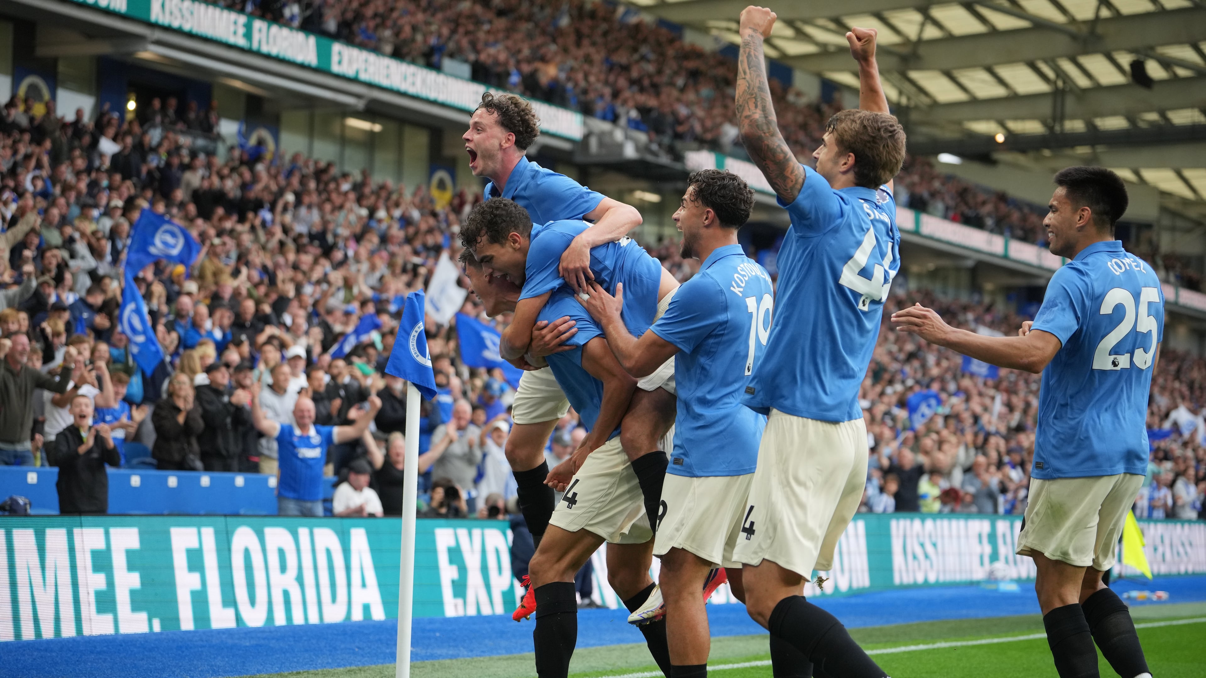 Brighton players celebrate after third goal during the English Premier League soccer match between Brighton & Hove Albion and Arsenal in Brighton, England, Saturday, Sept. 19, 2026. (AP Photo/Kin Cheung)