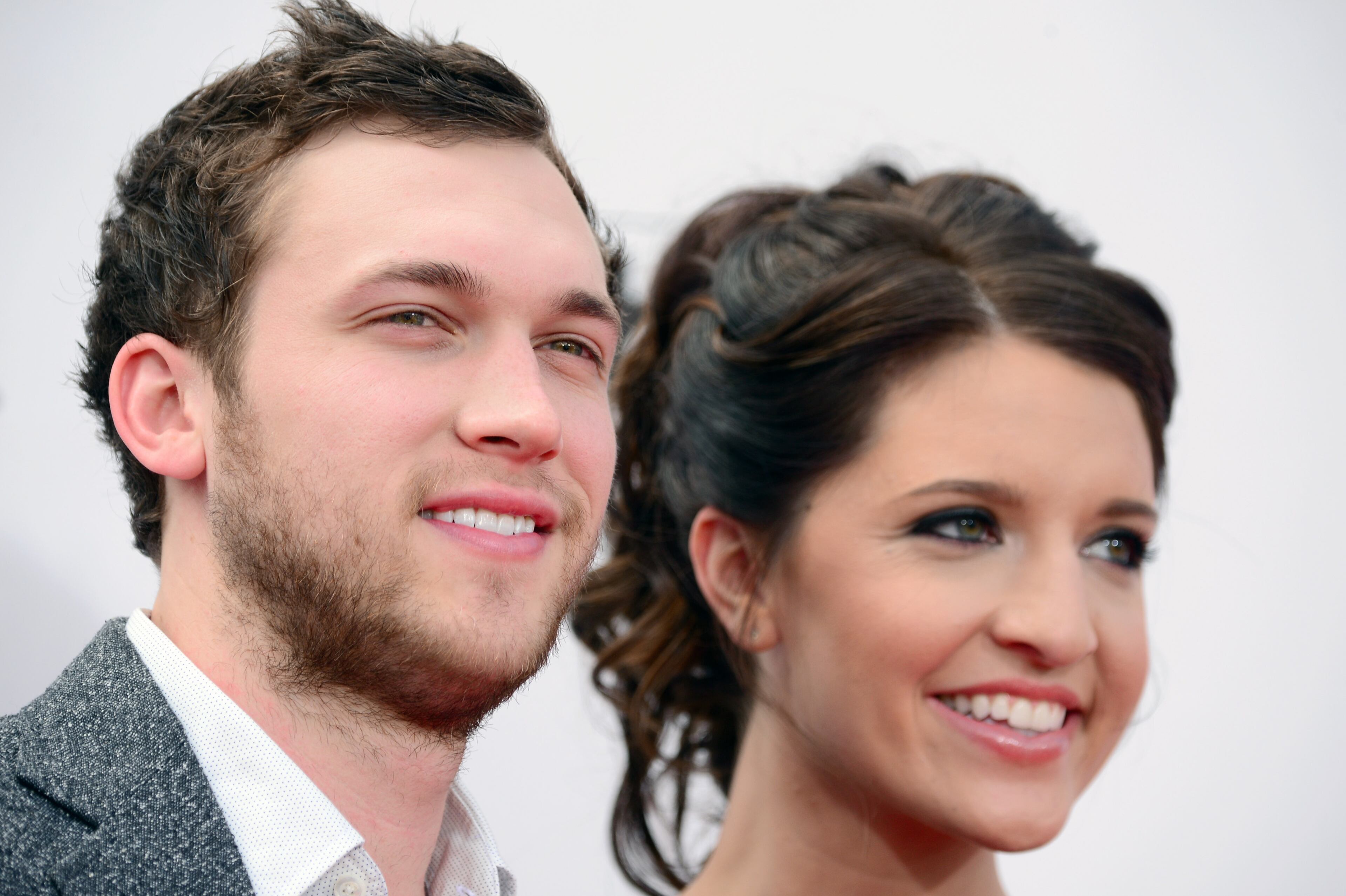 FILE - DECEMBER 26: "American Idol" season 11 winner Phillip Phillips is engaged to Hannah Blackwell. LAS VEGAS, NV - MAY 18: Singer Phillip Phillips (L) and Hannah Blackwell attend the 2014 Billboard Music Awards at the MGM Grand Garden Arena on May 18, 2014 in Las Vegas, Nevada. (Photo by Frazer Harrison/Getty Images)