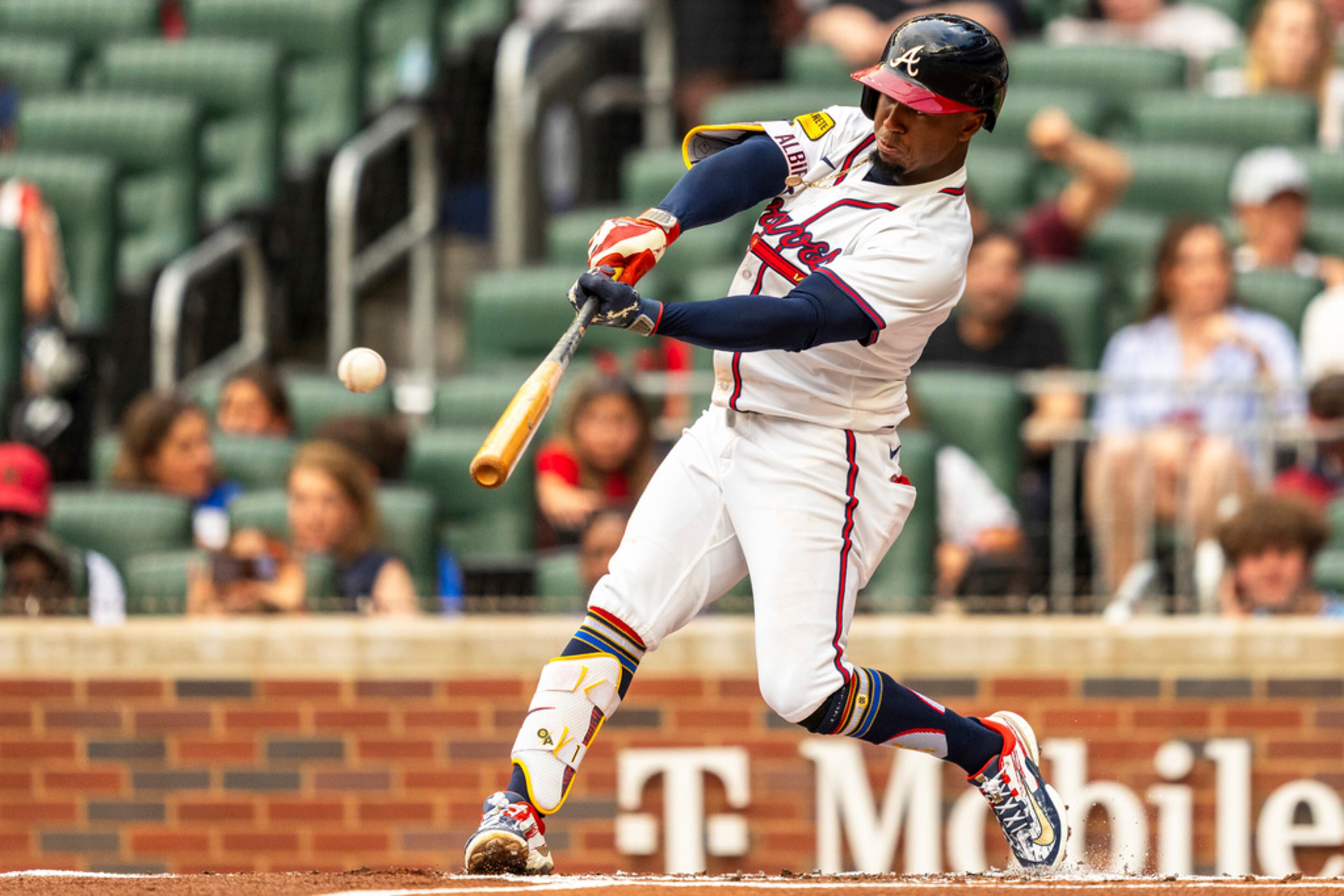 Atlanta Braves' Ozzie Albies hits a single during the first inning of a baseball game against the San Francisco Giants, Thursday, July 4, 2024, in Atlanta. (AP Photo/Jason Allen)