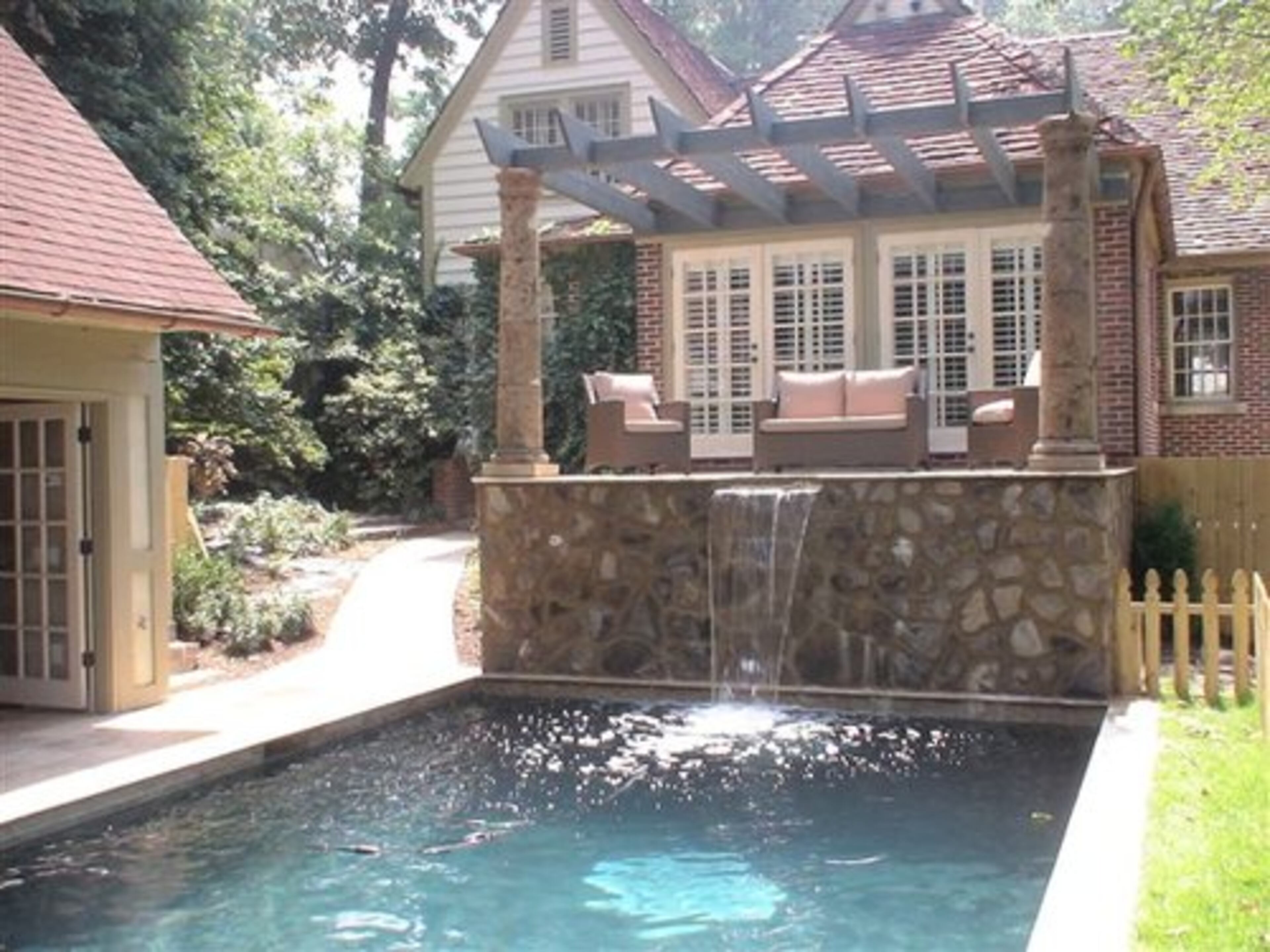 An unanticipated benefit of the redesign is that you can sit in the hot tub and have a straight view of the plasma screen in the indoor kitchen/lounge area. Everyone can be in their own space inside or out, and still be connected, Epperson said. BEST FEATURE: "Laying in bed and listening to the waterfall."