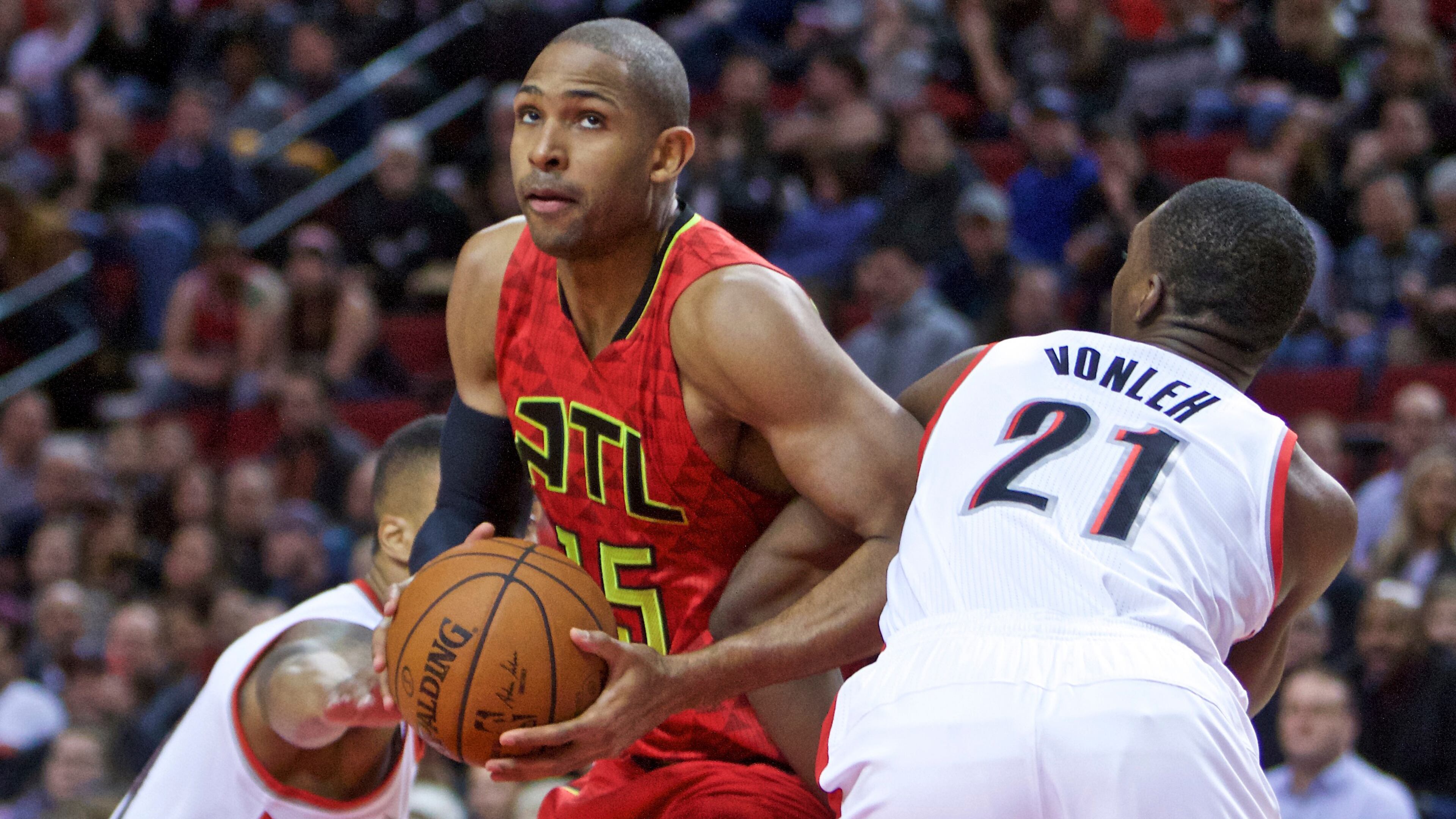 Atlanta Hawks center Al Horford drives past Portland Trail Blazers forward Noah Vonleh, right, during the first half of an NBA basketball game in Portland, Ore., Wednesday, Jan. 20, 2016. (AP Photo/Craig Mitchelldyer)
