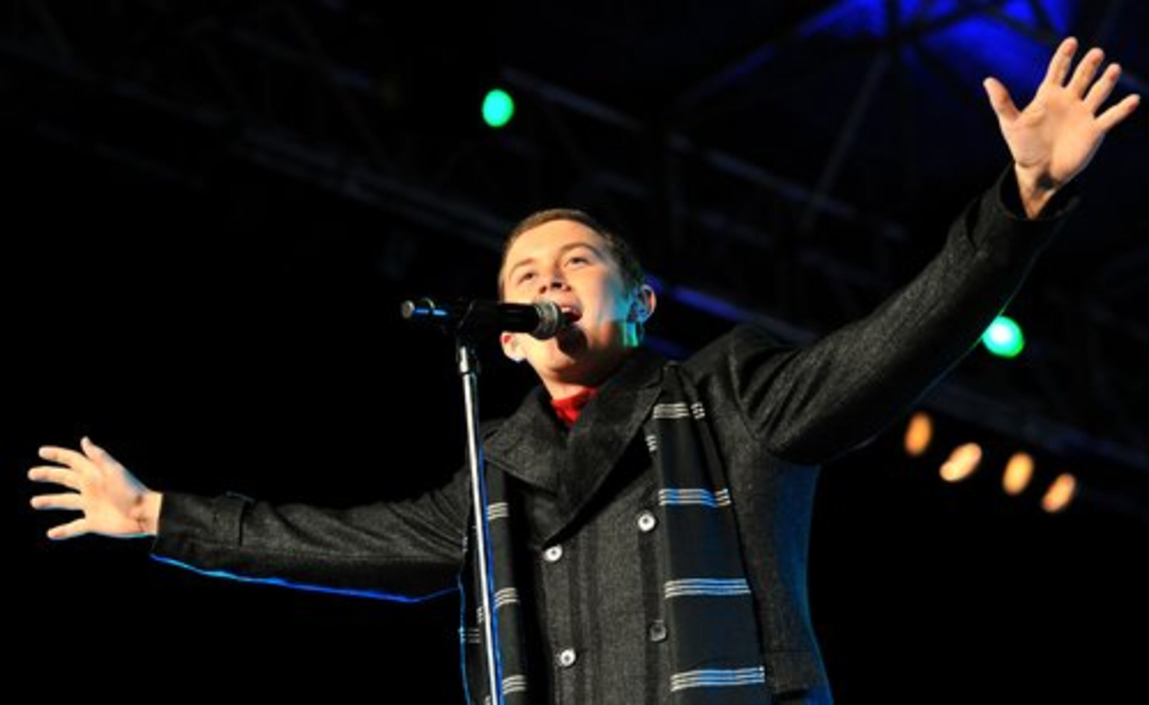 American Idol Season 10 winner Scotty McCreery performs during the Macy's Great Tree Lighting Show at Lenox Square Mall on Thursday, November 24, 2011.
