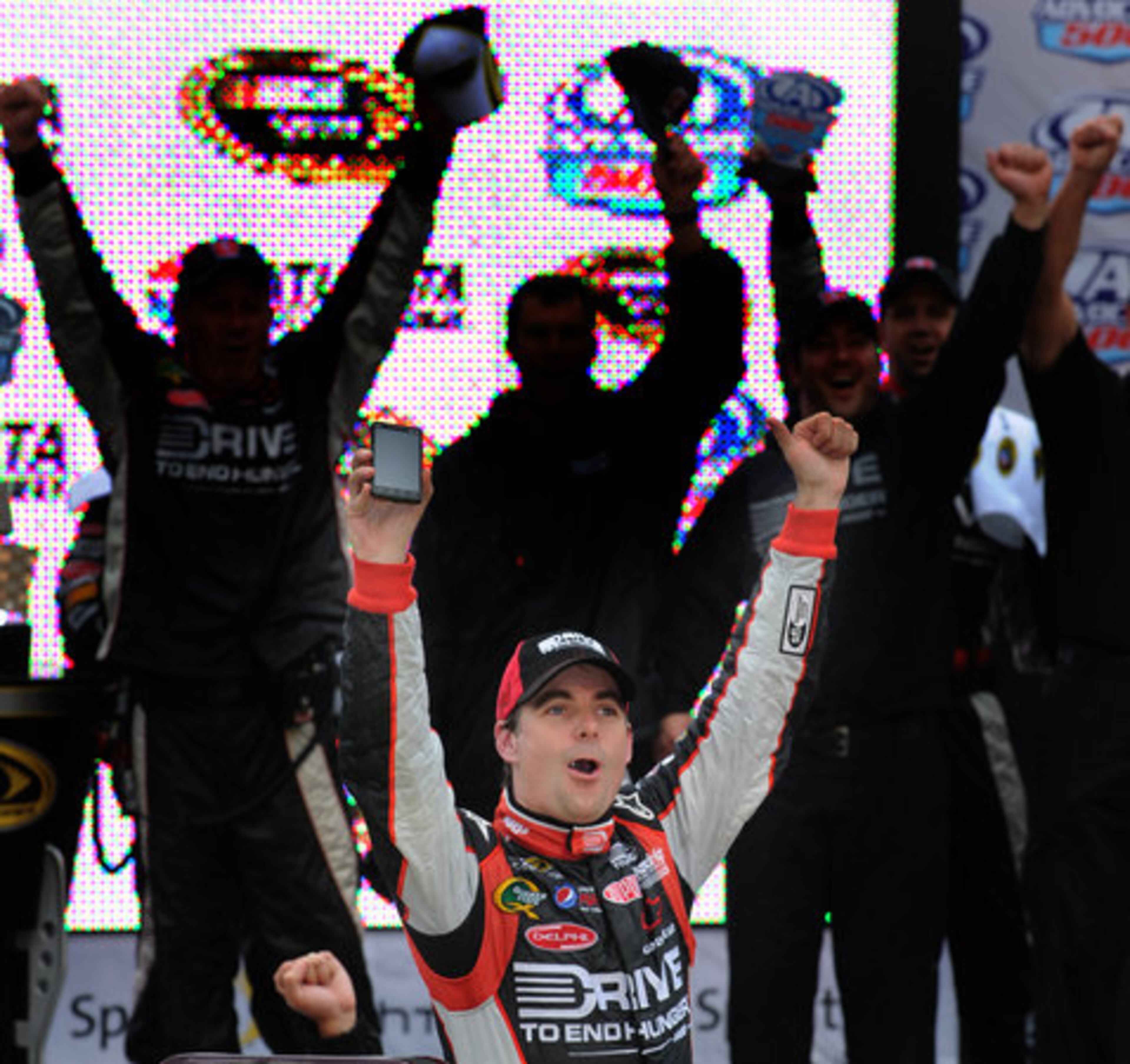 Jeff Gordon celebrates after winning the 52nd Annual AdvoCare 500 at the Atlanta Motor Speedway on Tuesday, Sept 6, 2011. The race stared today because of rain on Sunday.