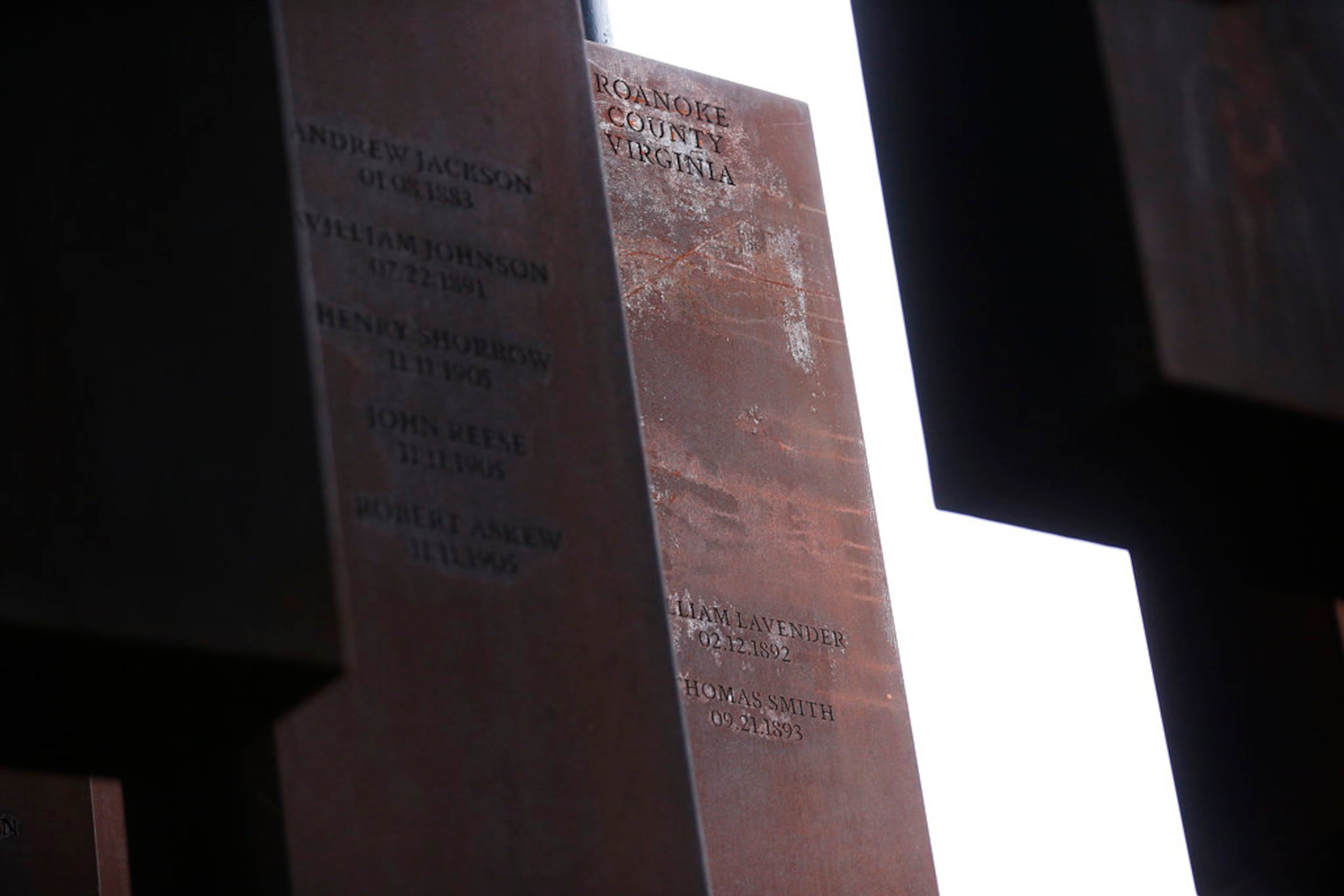 This photo shows part of the display at the National Memorial for Peace and Justice, a new memorial to honor thousands of people killed in racist lynchings, Monday, April 23, 2018, in Montgomery, Ala. The national memorial aims to teach about America's past in hope of promoting understanding and healing. It's scheduled to open on Thursday. (AP Photo/Brynn Anderson)