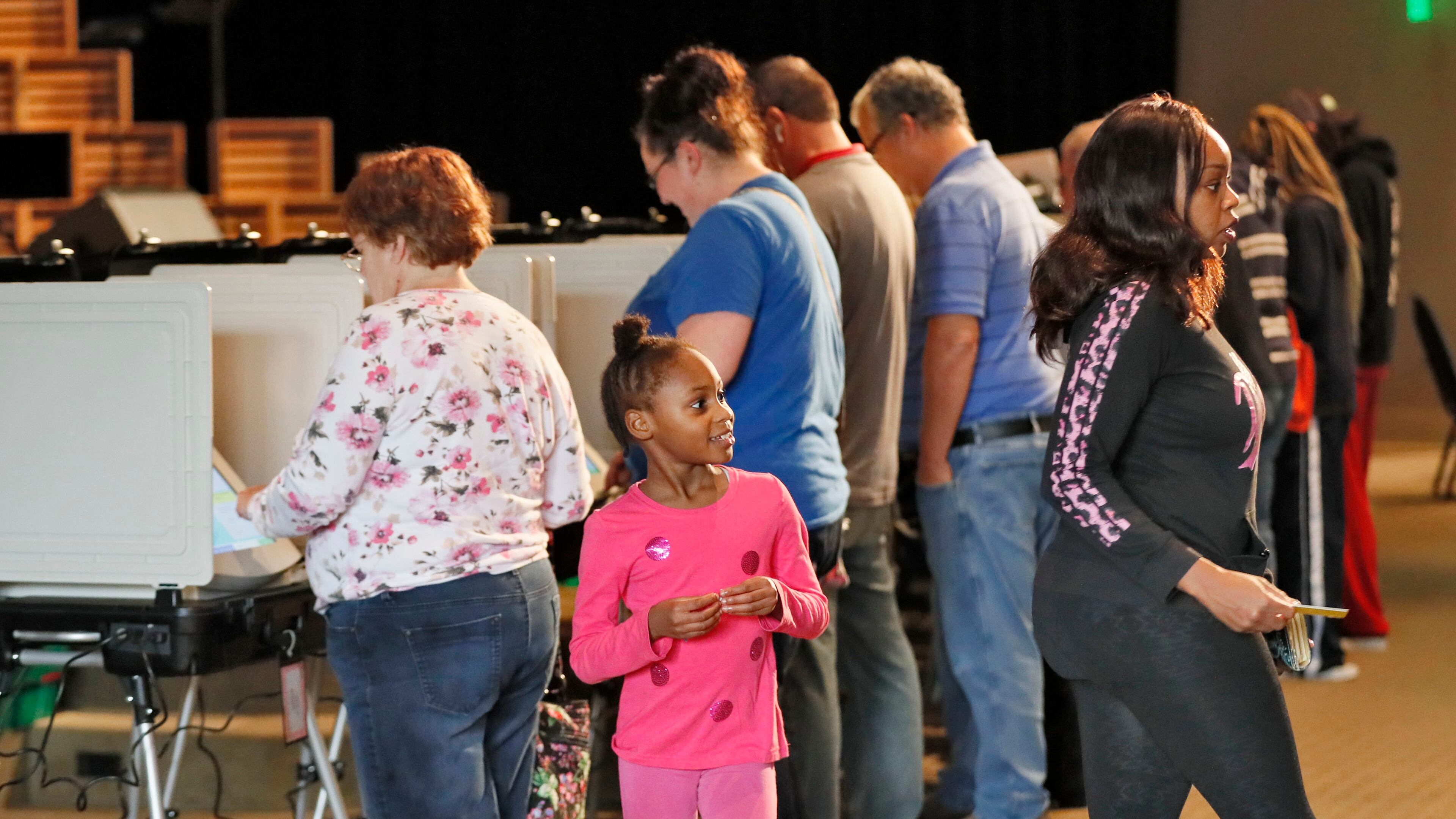 A steady steam of people vote at the Noonday Baptist Church in Marietta on Tuesday, Nov. 6, 2018.