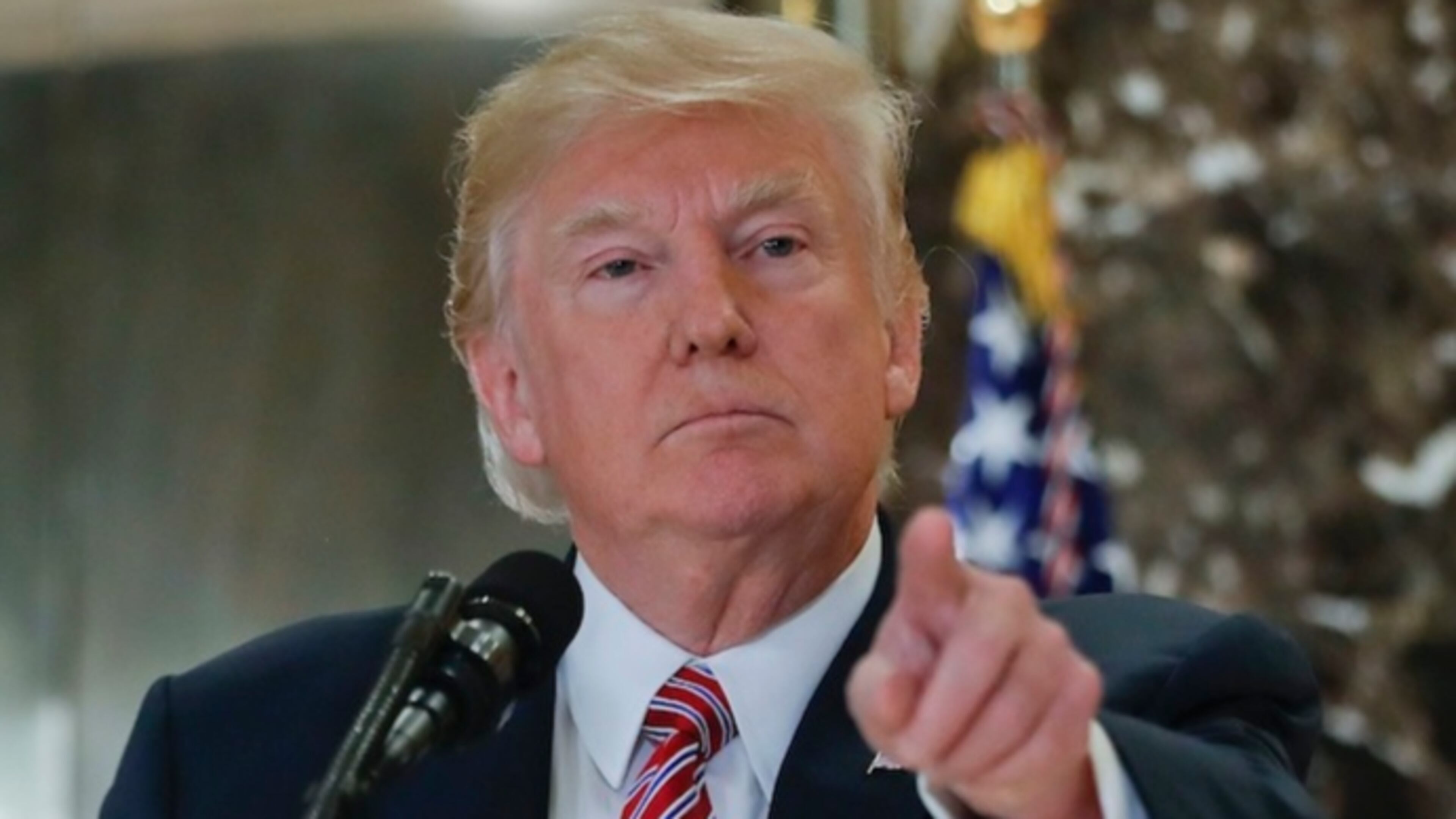 President Donald Trump points to a member of the media while answering questions in the lobby of Trump Tower, Tuesday, Aug. 15, 2017 in New York. (AP Photo/Pablo Martinez Monsivais)