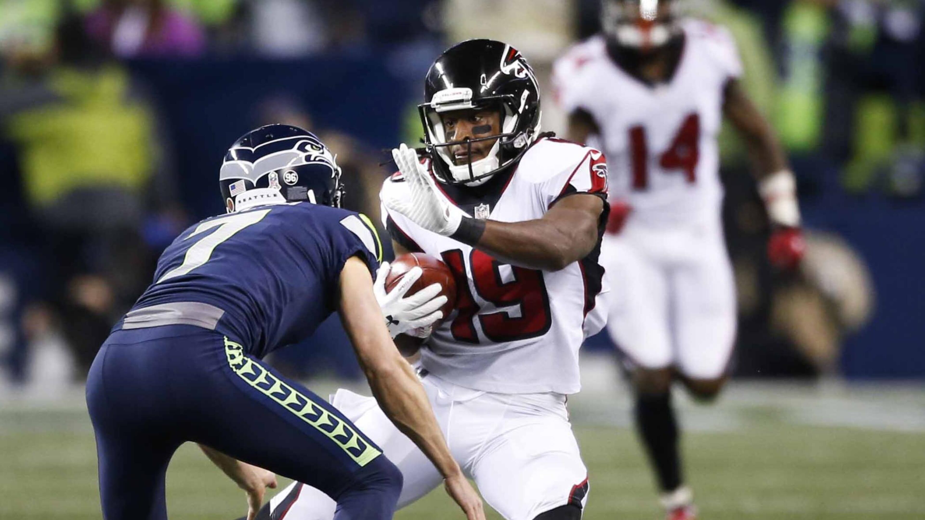 SEATTLE, WA - NOVEMBER 20: Kicker Blair Walsh #7 of the Seattle Seahawks tries to block wide receiver Andre Roberts #19 of the Atlanta Falcons on the opening kickoff in the first quarter of the game at CenturyLink Field on November 20, 2017 in Seattle, Washington. (Photo by Otto Greule Jr /Getty Images)