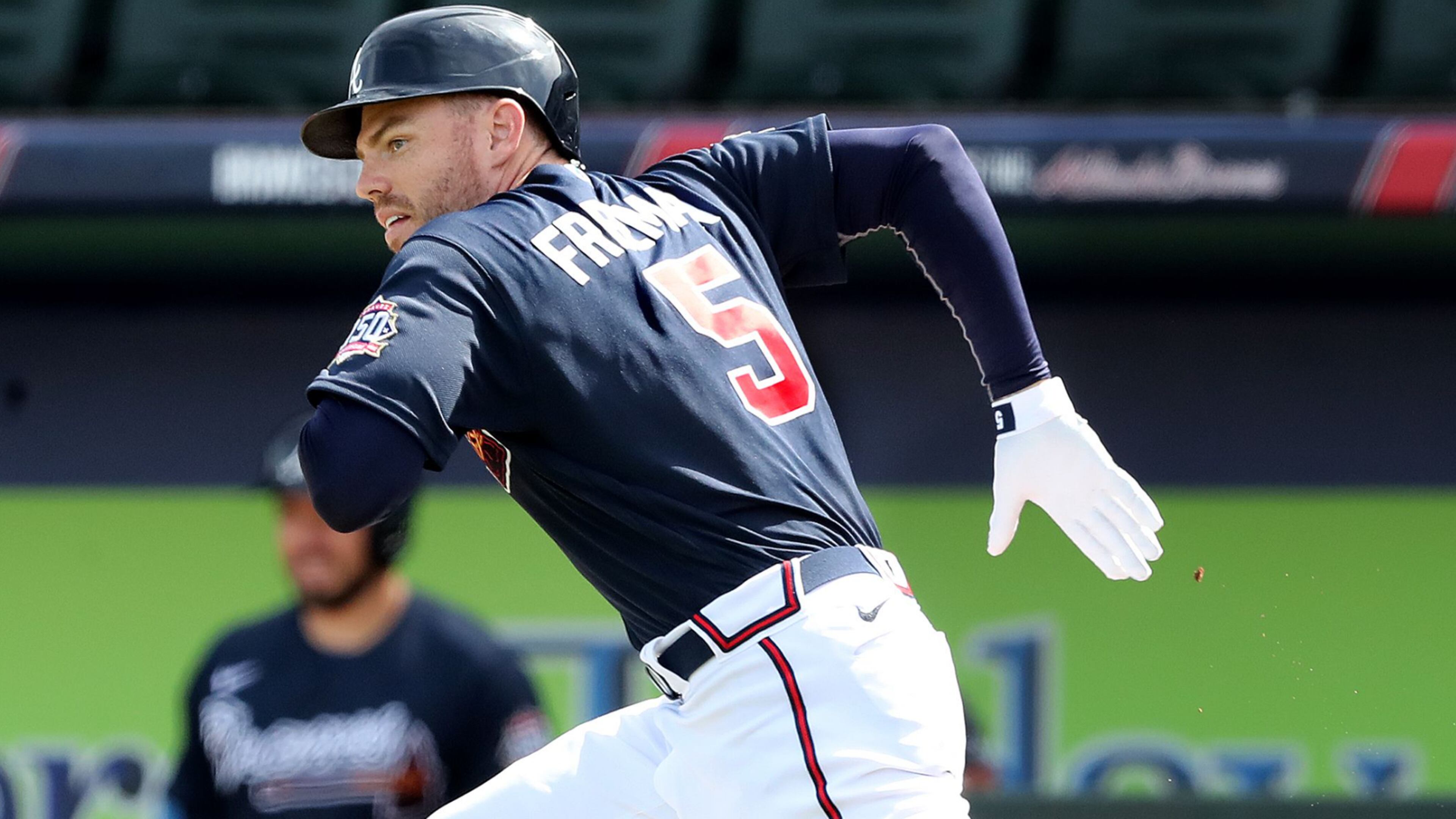 Atlanta Braves first baseman Freddie Freeman trys to beat out a ground ball during the fourth inning making his first scheduled spring training appearance against the Minnesota Twins in a MLB spring training baseball game at CoolToday Park on Friday, March 5, 2021, in North Port. The Twins turned a double play on Freeman. Curtis Compton / Curtis.Compton@ajc.com