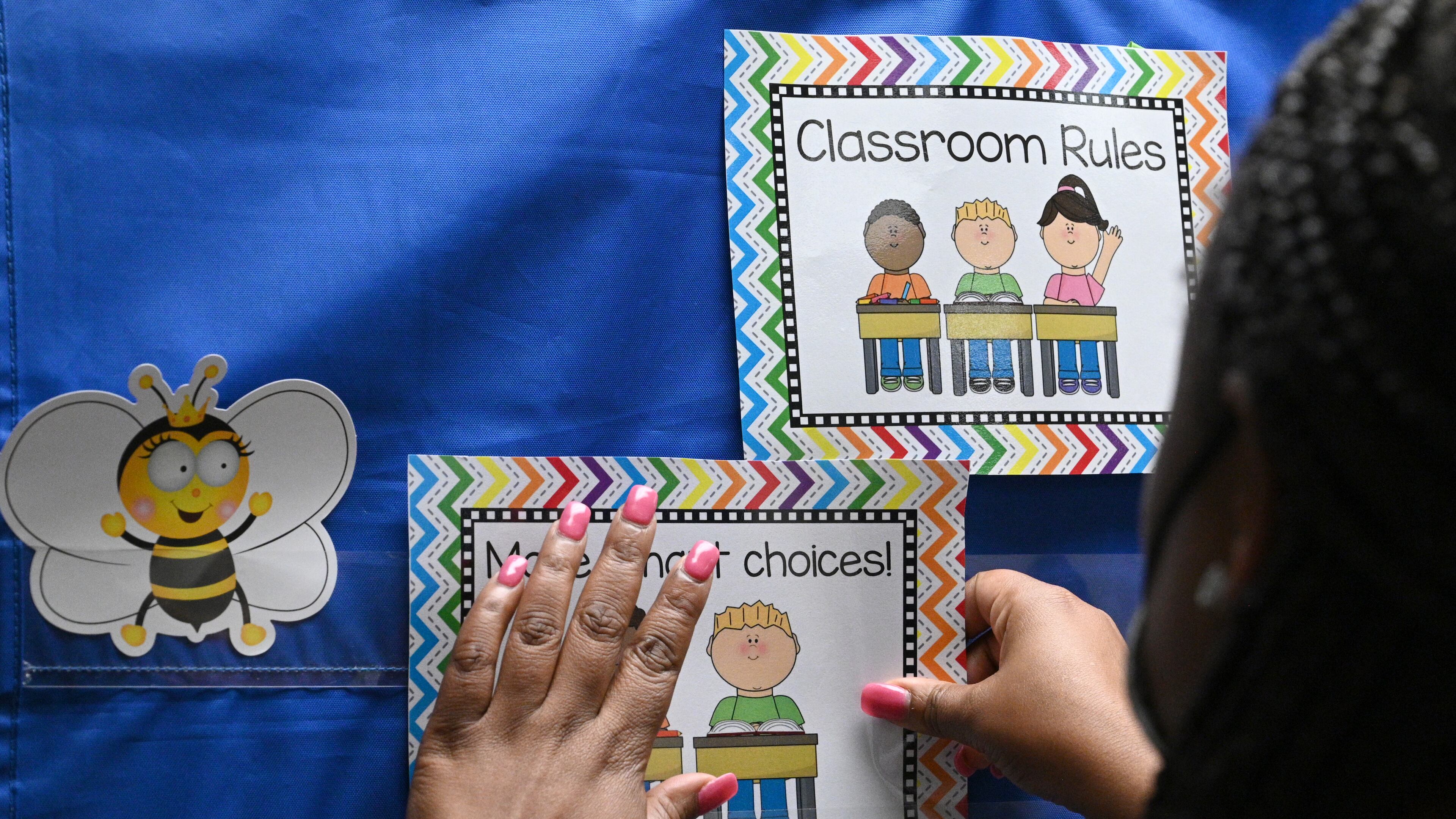An Anderson-Livsey Elementary School teacher prepares her classroom on July 28, 2022. The school was recognized as a literacy leader by the Georgia Department of Education for its improvement in reading. It was among eight schools in Gwinnett County to receive the recognition. (Hyosub Shin / Hyosub.Shin@ajc.com)