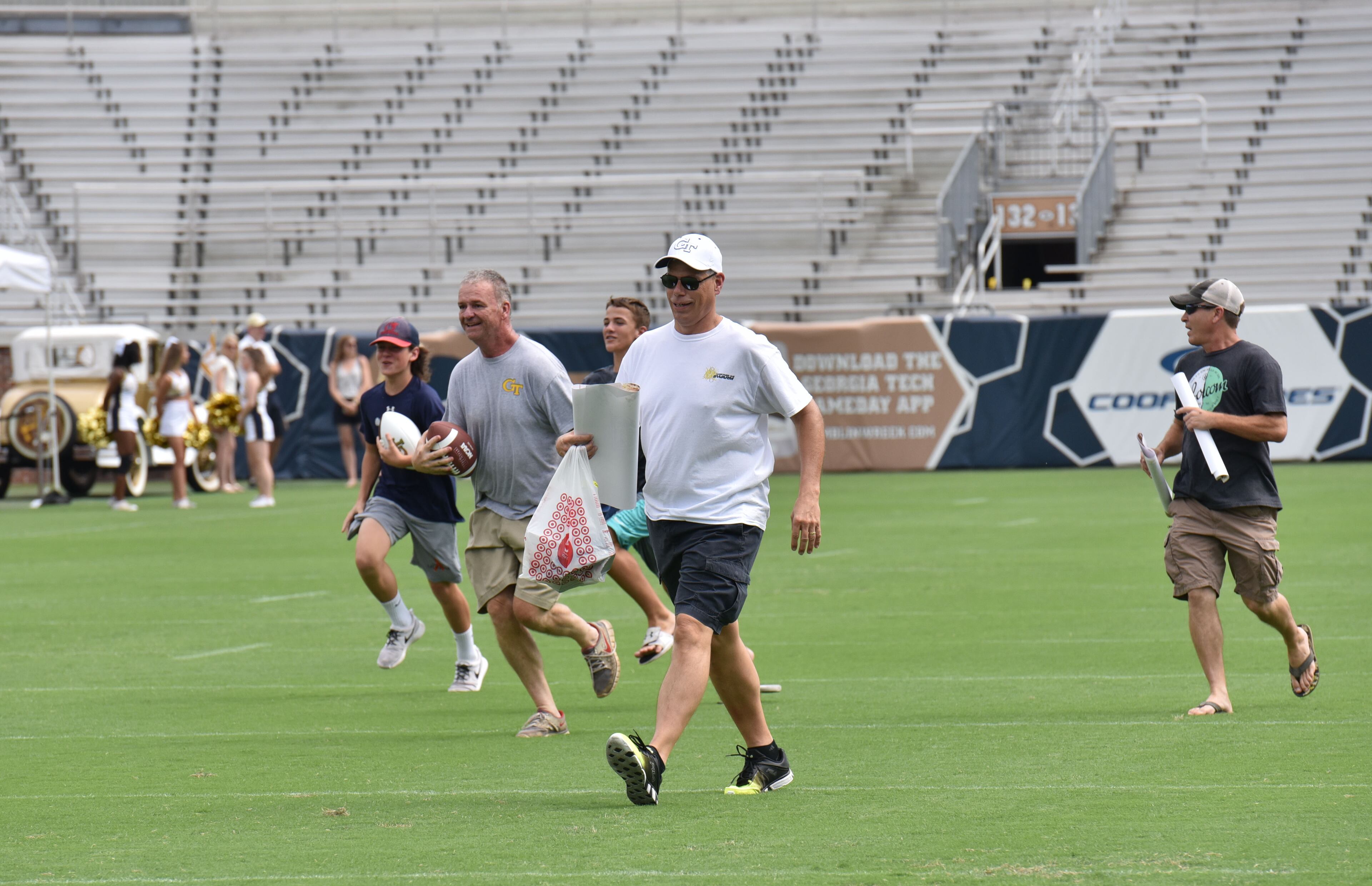 Georgia Tech football fans rush to their favorite players during 2016 Football Fan Day at Bobby Dodd Stadium on Saturday, August 6, 2016. HYOSUB SHIN / HSHIN@AJC.COM