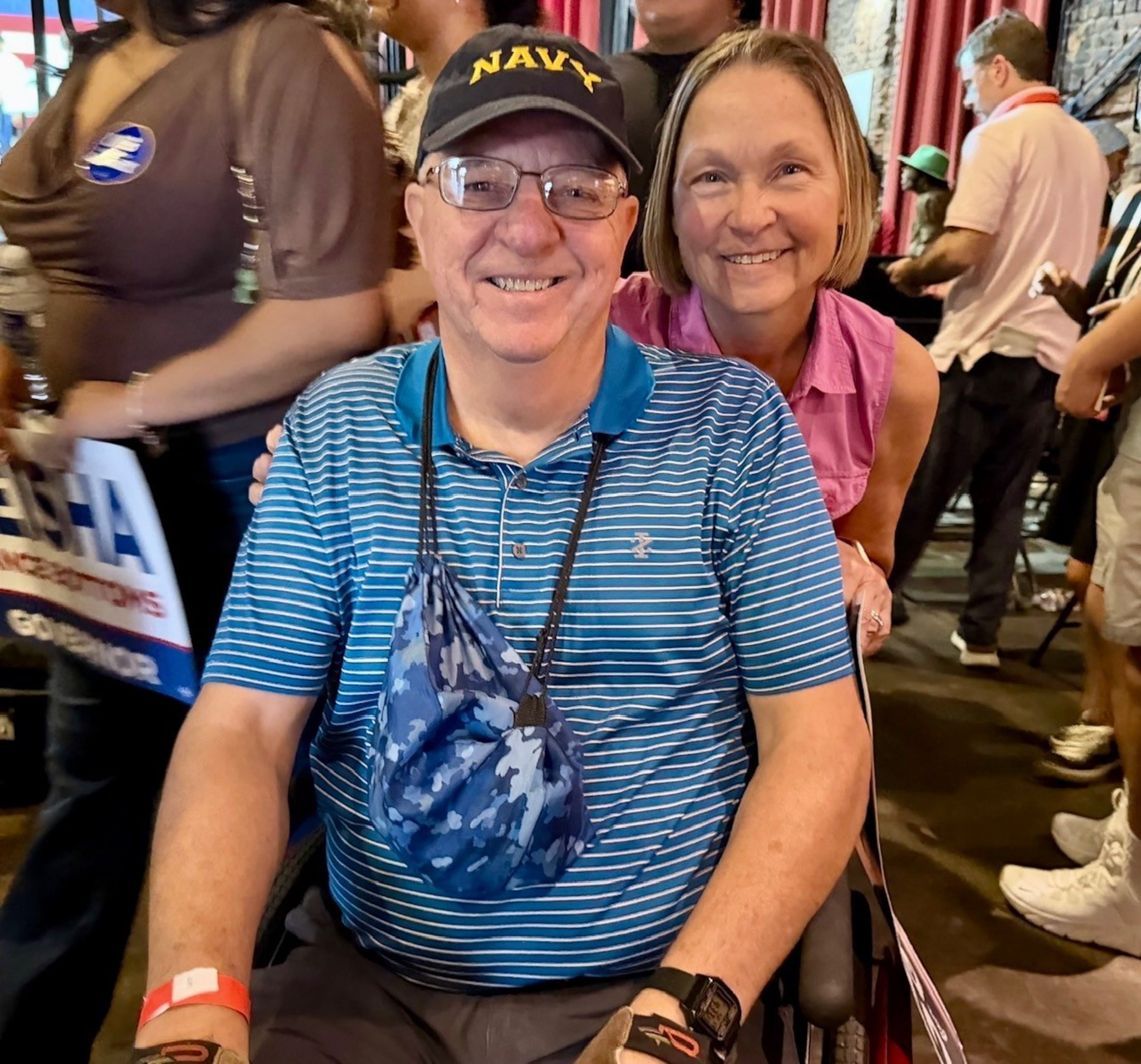 John and Mary Konkol, a Democrat and a Republican, attend U.S. Sen. Jon Ossoff's rally in Athens on Sunday, Sept. 13, 2026. They will support him in November. (Patricia Murphy/AJC)