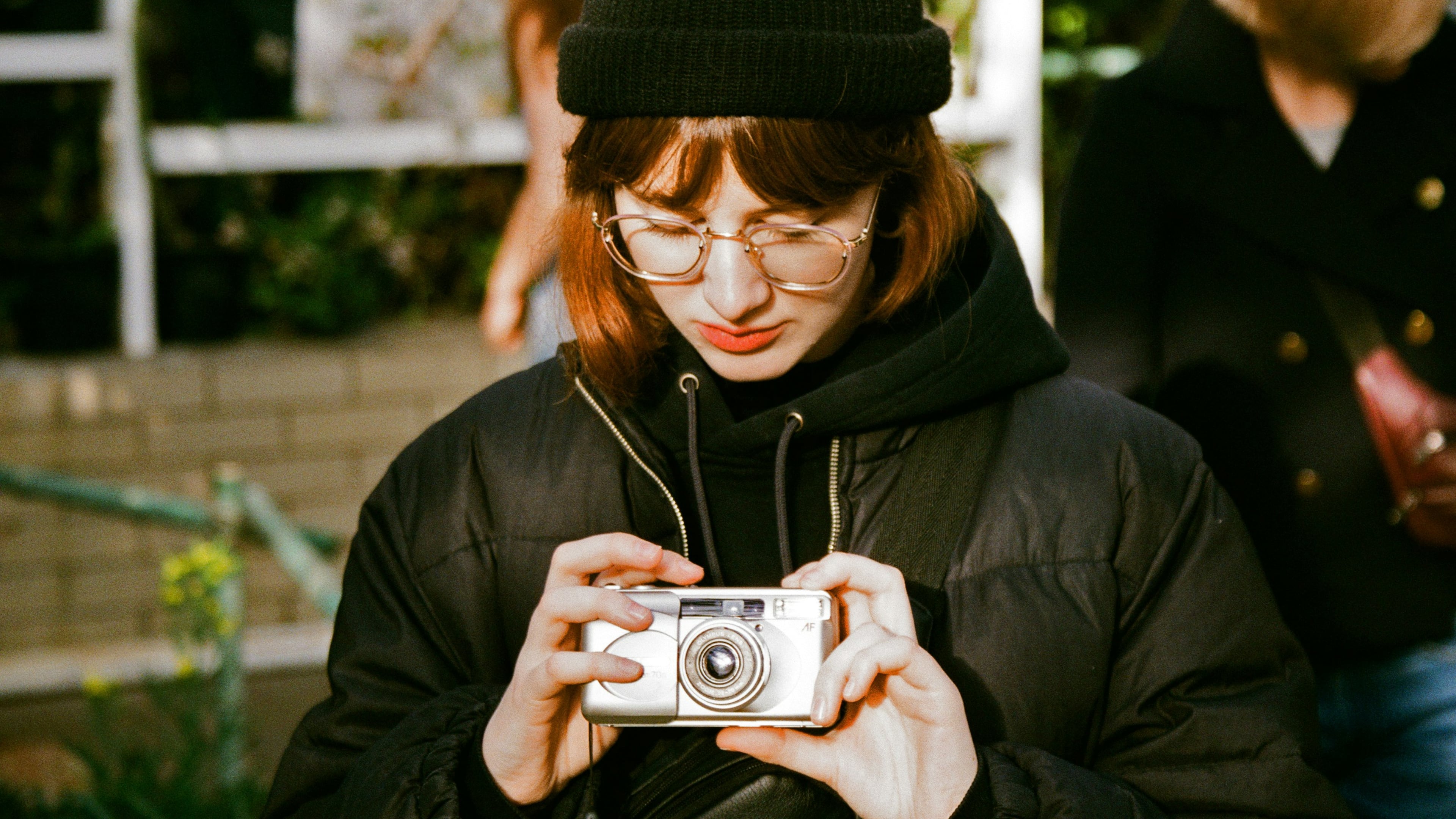 Film photography is one of several analog hobbies gaining popularity as more people look to spend less time on their phones. (Oleh Syzov/Unsplash)
