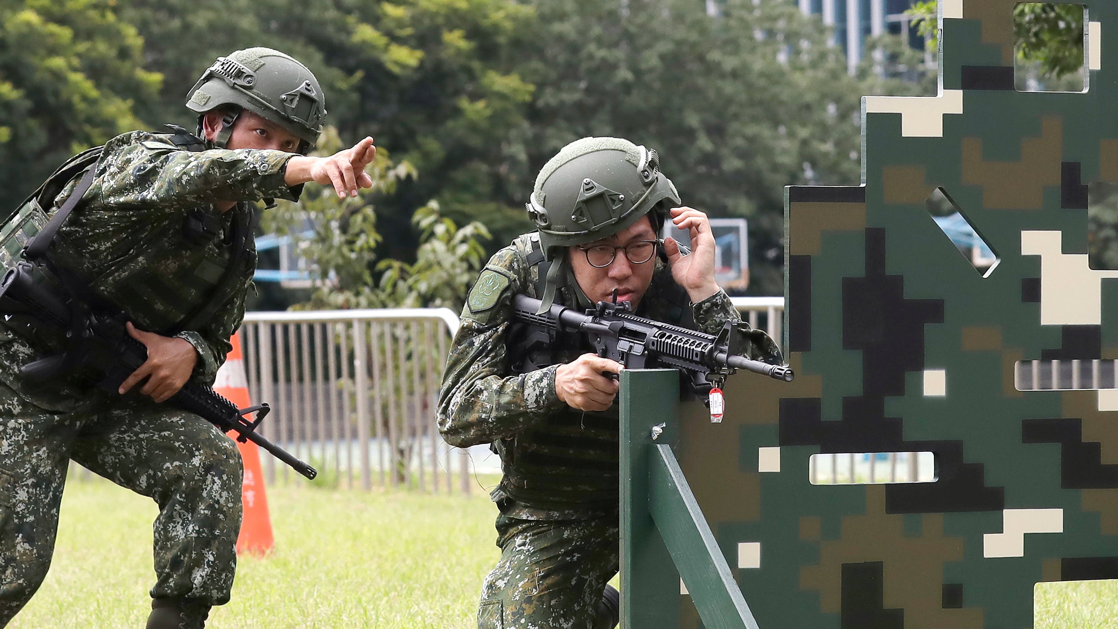 Soldiers conduct shooting training during the annual Han Kuang military exercises in Taipei, Taiwan, Wednesday, Aug. 5, 2026. (AP Photo/Chiang Ying-ying)