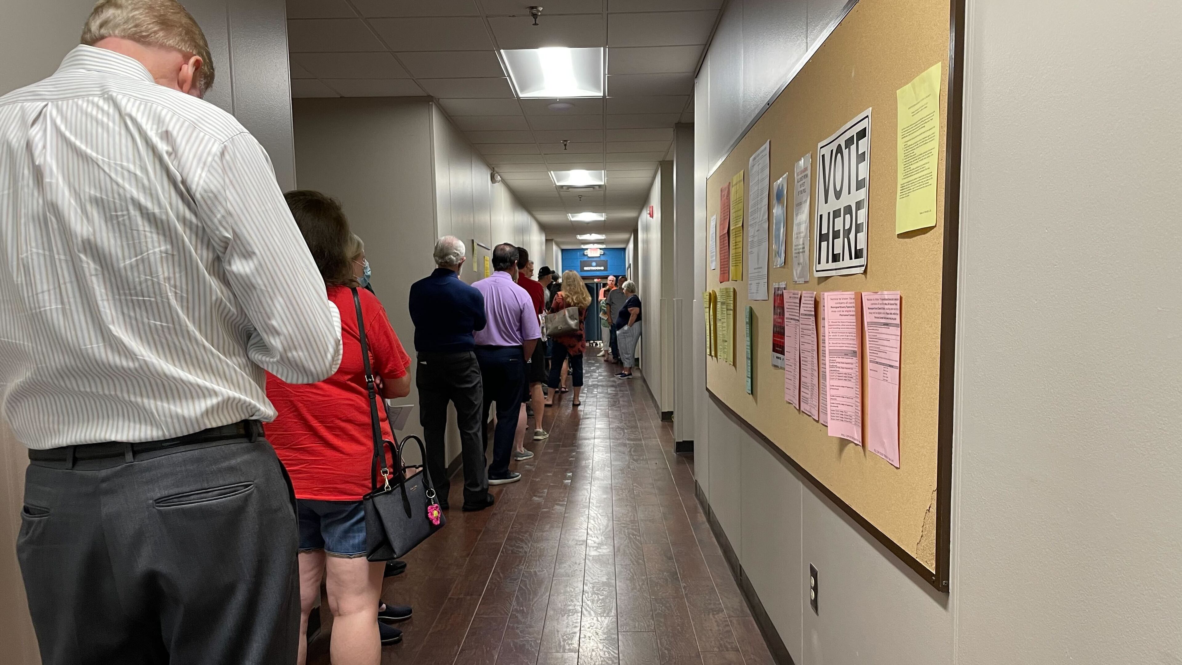Voters wait in line at East Side Church in East Cobb County Tuesday morning. (Jamie Sarrio McMurtrie)