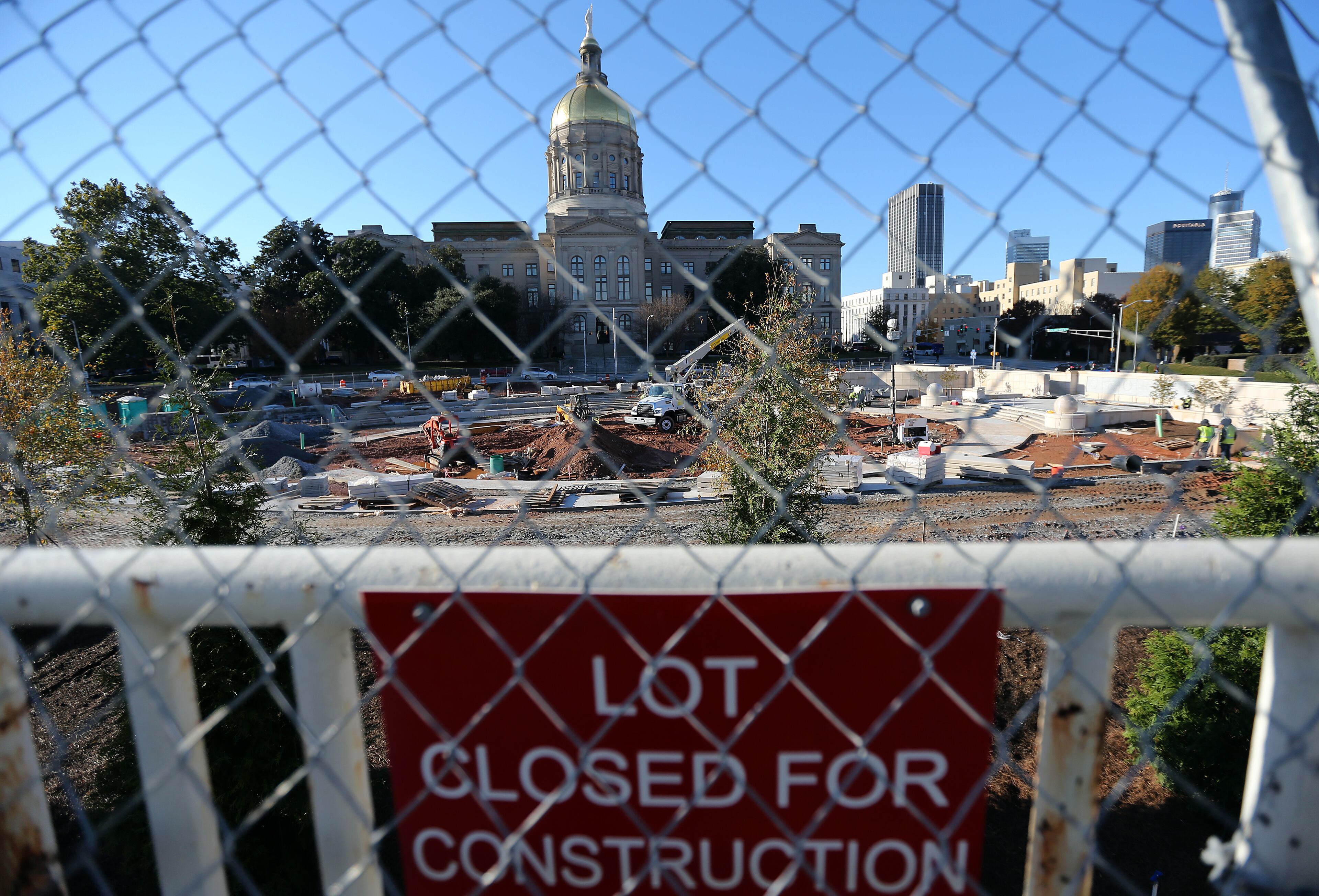 As seen in this Nov. 18, 2014 photo, Liberty Plaza, the new park and protest area across from the State Capitol, still has a ways to go as construction workers race to finish before the the Legislative session kicks off at the beginning of 2015.