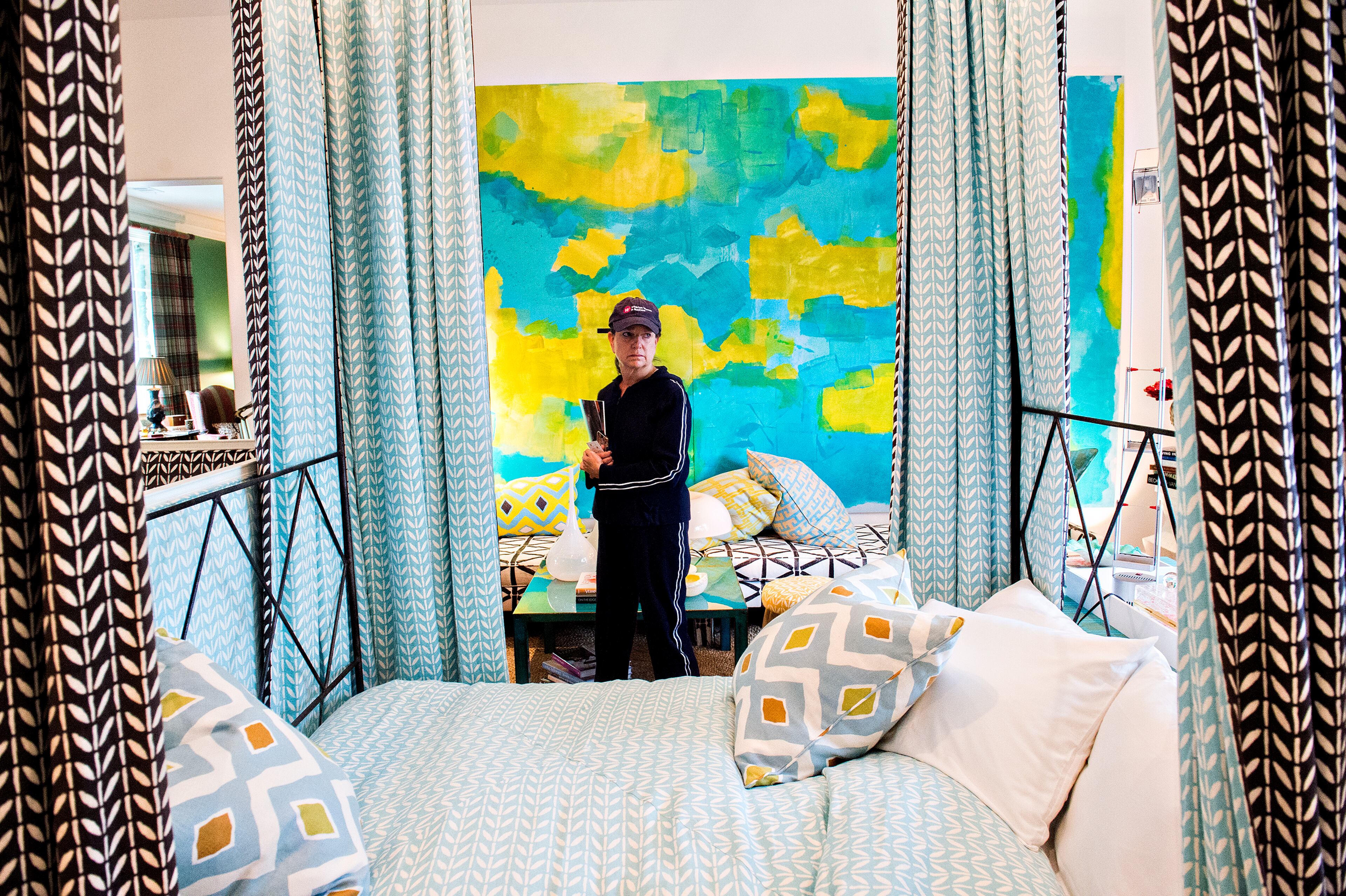 November 21, 2015 Atlanta - Susan Bolch checks out the four poster bed in one of the children's rooms inside the 2015 Home for the Holidays Designer Showhouse located at 1150 West Garmon Rd. in Atlanta on Saturday, November 21, 2015. This year's 15,000 sq. ft. estate is a collaboration between renowned architecture firm, Harrison Design, and Sheehan Built Homes. Inspired by Scotland's Stonefield Castle, the sprawling "Millwood Manor" is open through Sunday, Dec. 13. JONATHAN PHILLIPS / SPECIAL