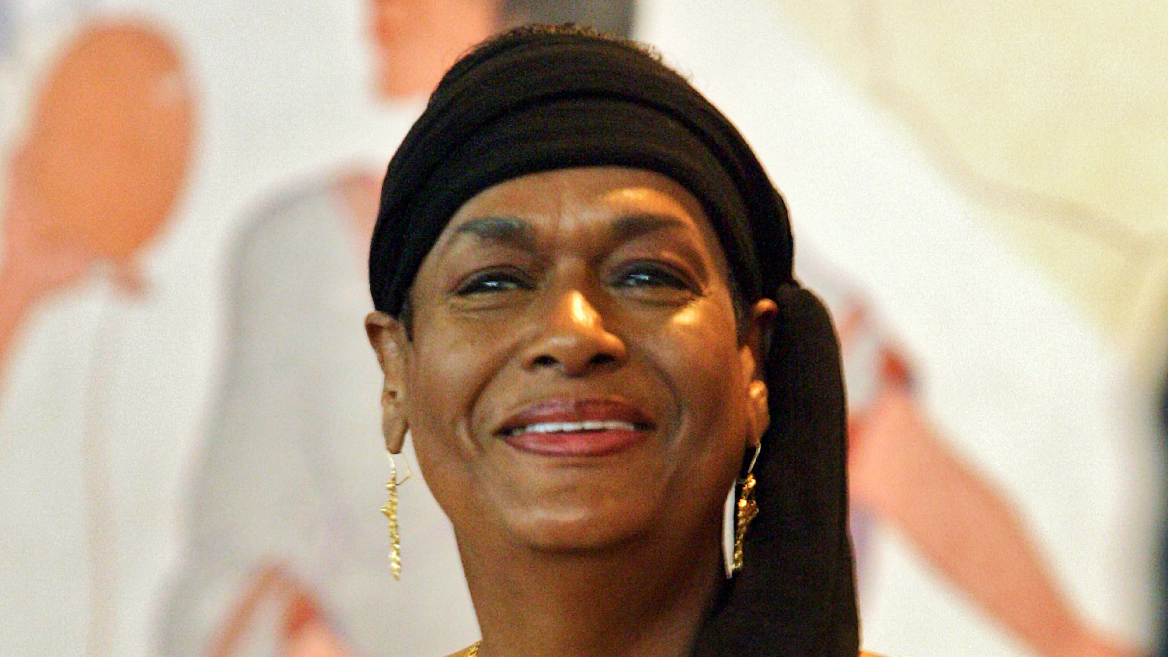 FILE - Khadijah Farrakhan, wife of Nation of Islam leader Louis Farrakhan, stands before members of the 20th Navajo Nation Council Wednesday, July 19, 2006 in Window Rock, Ariz. (AP Photo/Matt York, File)