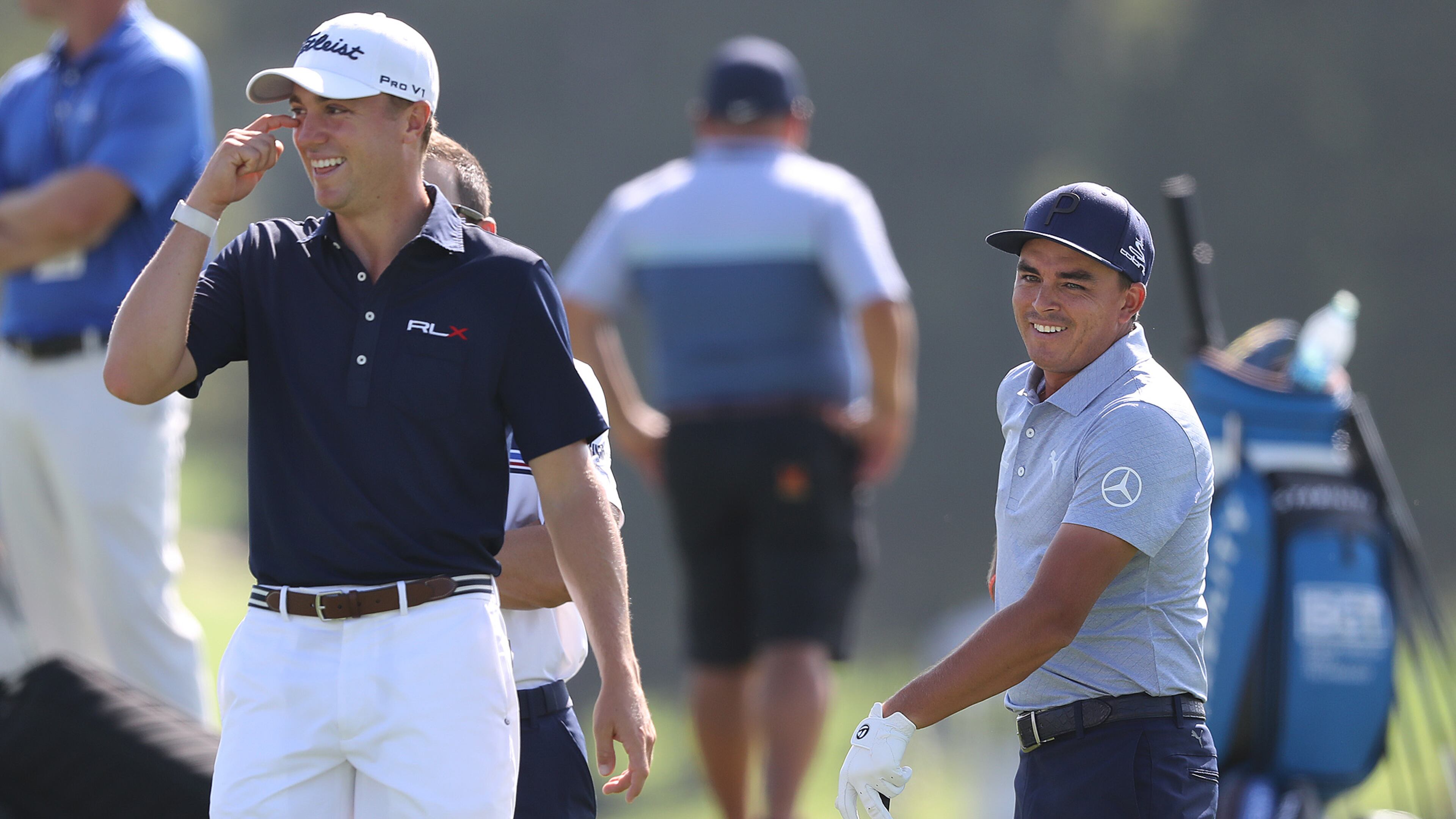Ricky Fowler shares a laugh with Justin Thomas as they prepare to play a practice round together. (Curtis Compton/ccompton@ajc.com)