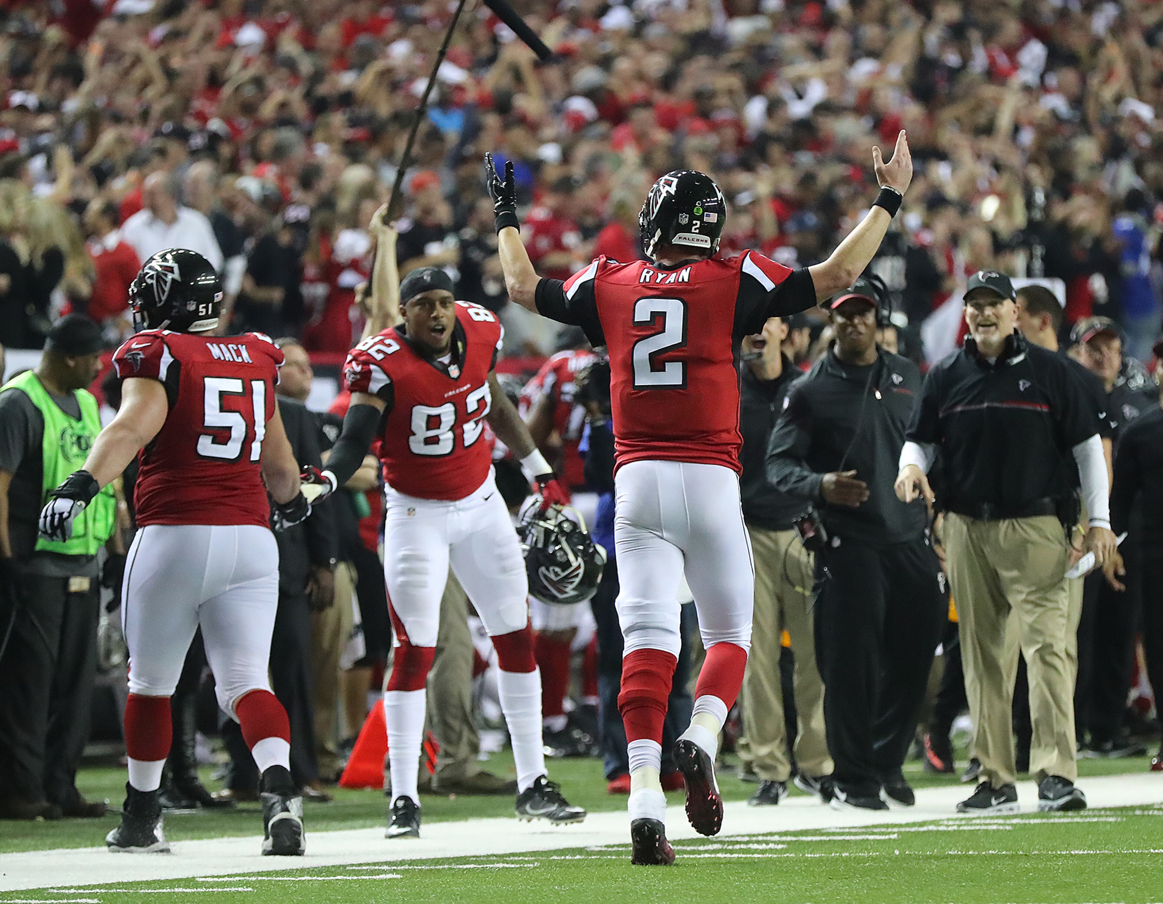 January 14, 2017, Atlanta: Falcons quarterback Matt Ryan plays the crowd urging them to cheering after tossing a touchdown pass to wide receiver Mohamed Sanu for a 36-13 lead over the Seahawks during the fourth quarter in a NFL football NFC divisional playoff game on Saturday, Jan. 14, 2017, in Atlanta. The Falcons beat the Seahawks 36-20. Curtis Compton/ccompton@ajc.com