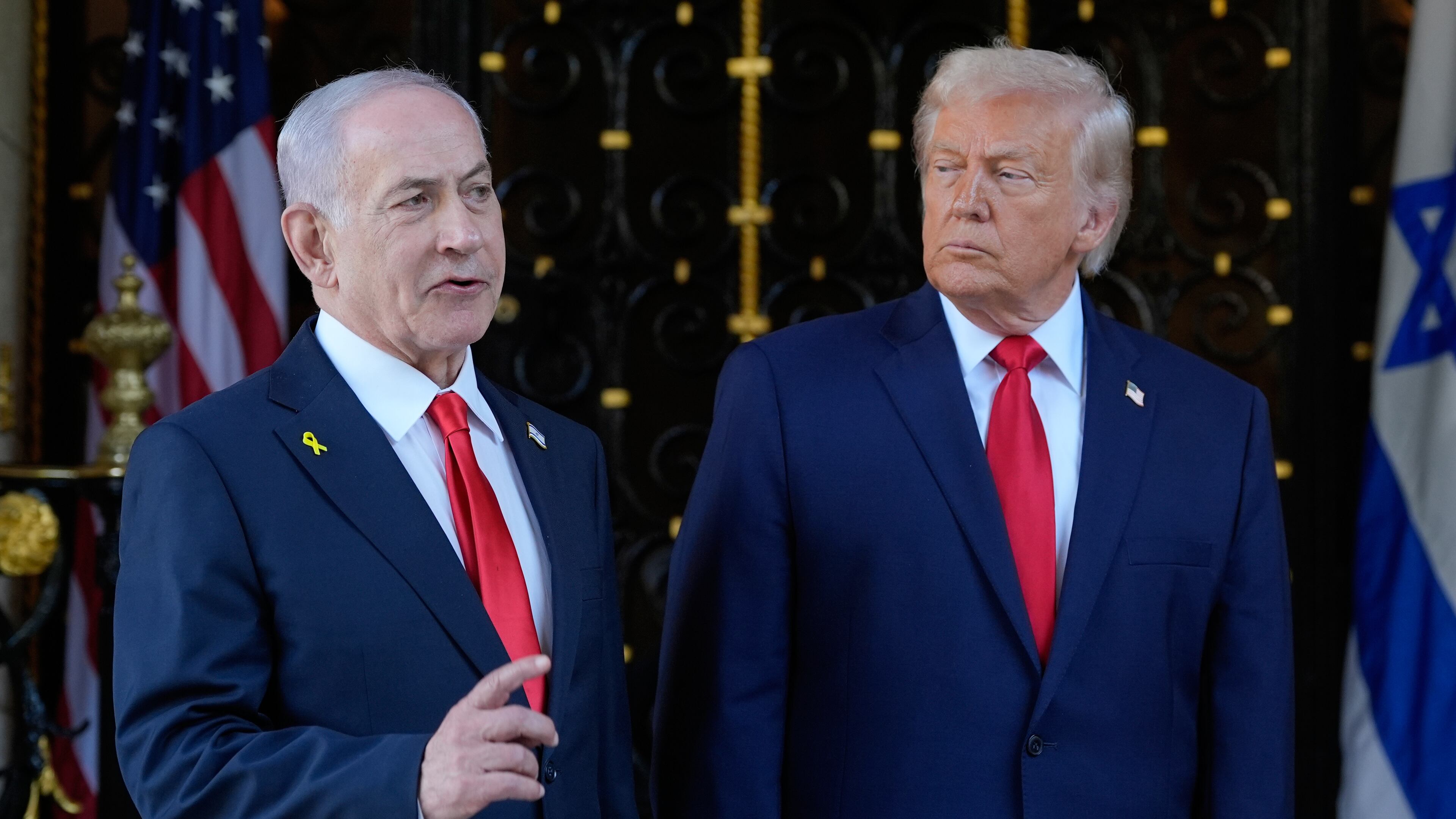 FILE - President Donald Trump listens as Israel's Prime Minister Benjamin Netanyahu speaks at President Donald Trump's Mar-a-Lago club, Dec. 29, 2025, in Palm Beach, Fla. (AP Photo/Alex Brandon, File)