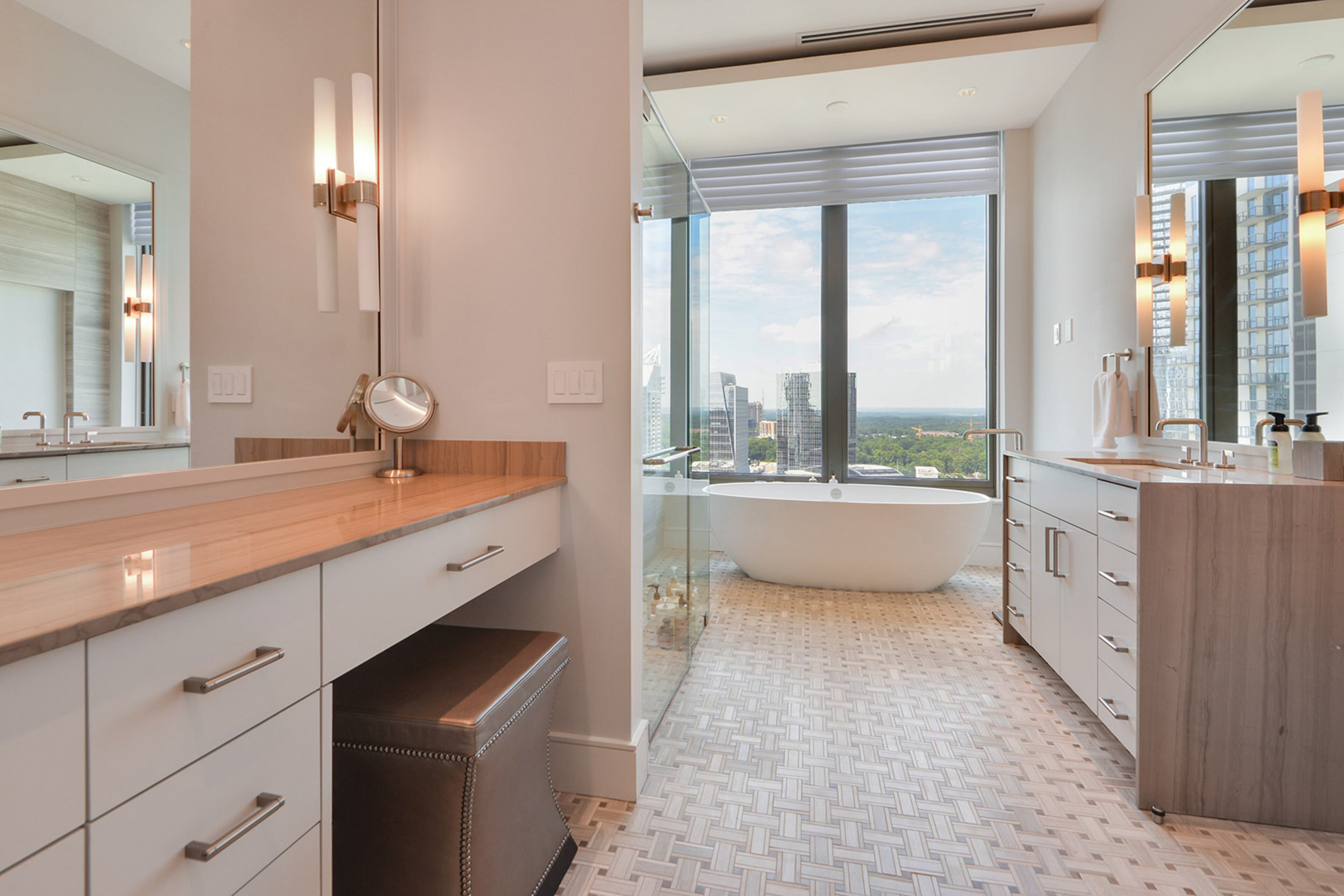 The primary bathroom provides lots of space along with a separate soaking tub and shower.