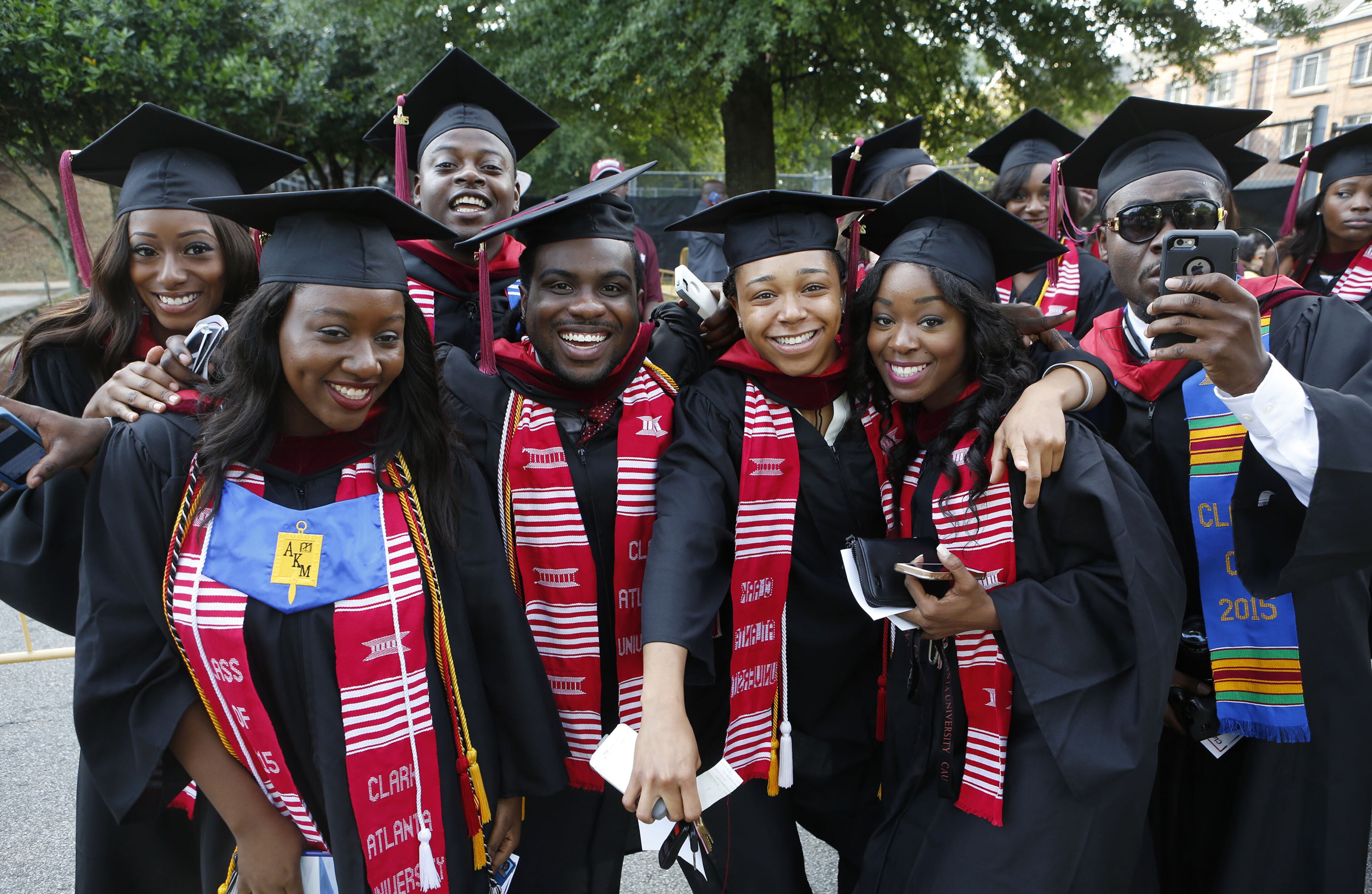 Clark Atlanta University students pose for a picture as they line up to graduate in Atlanta on Monday May 18, 2015. President Carlton Brown presided over his final graduation ceremony before retiring on June 30. The keynote speaker was Marc Morial, president and CEO of the National Urban League. (Photo by Phil Skinner)
