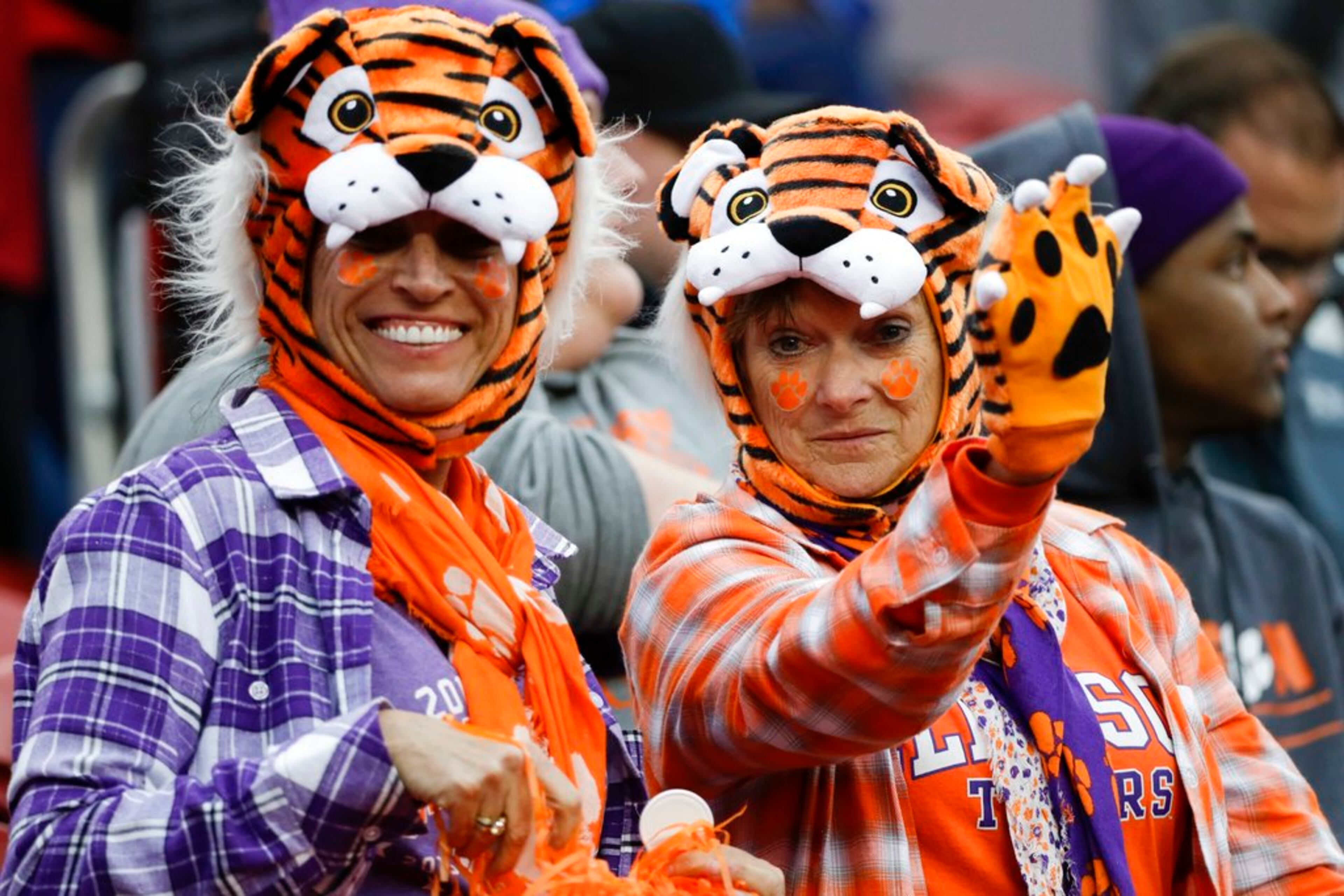 Fans wait for the start of the NCAA college football playoff championship game between Alabama and Clemson Monday, Jan. 7, 2019, in Santa Clara, Calif.