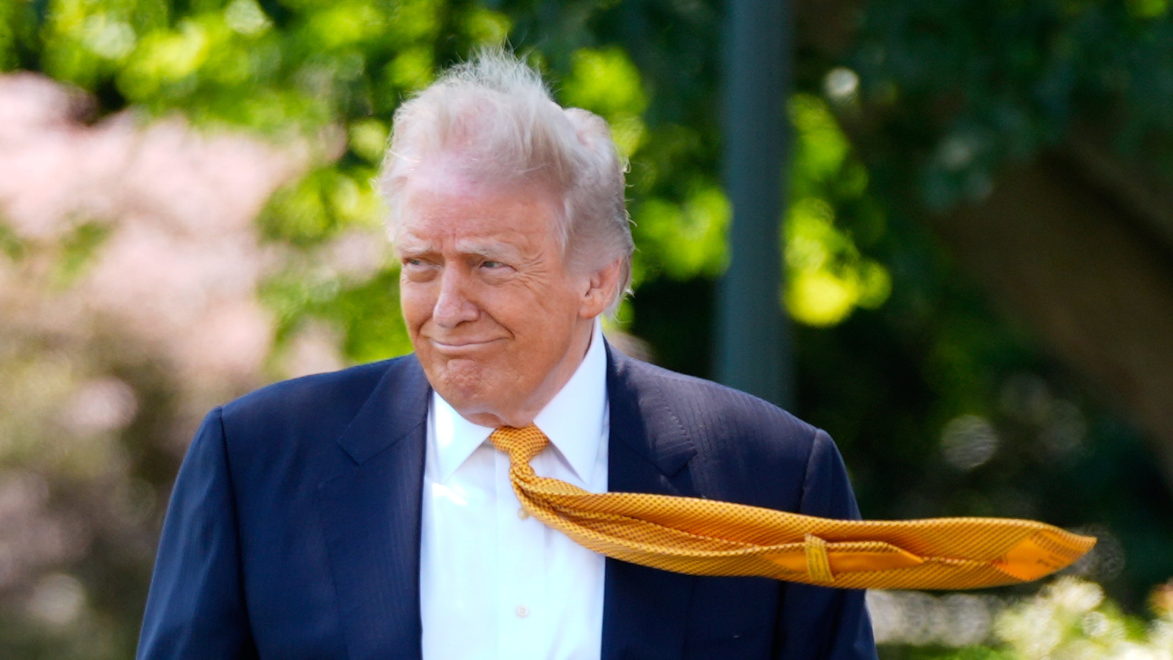 President Donald Trump walks as he leaves the White House for travel to Beijing, Tuesday, May 12, 2026, in Washington, to meet with China's President Xi Jinping. (AP Photo/Manuel Balce Ceneta)