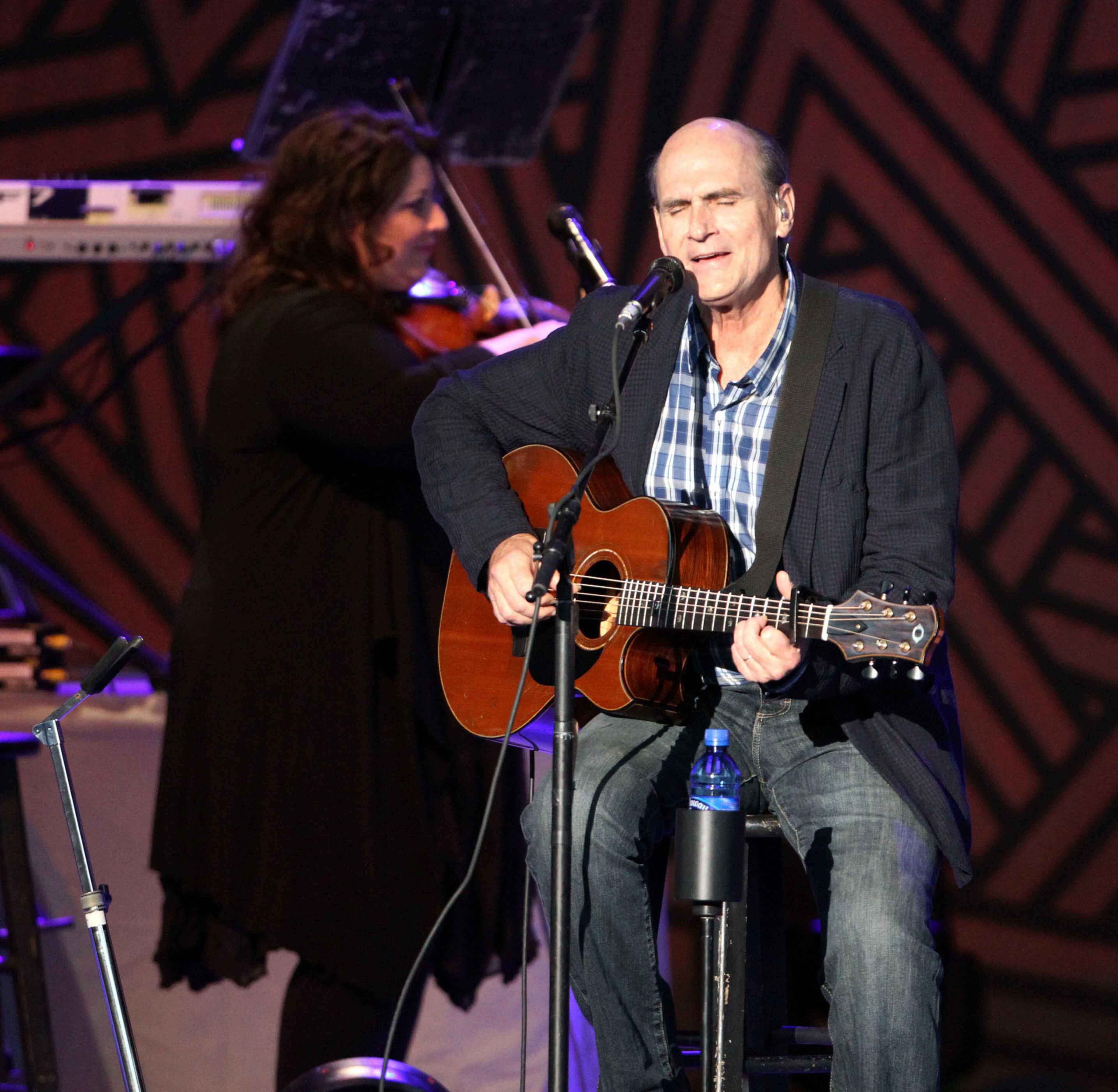 Iconic singer-songwriter-guitarist James Taylor serenaded a sold-out Verizon Wireless Amphitheatre in Alpharetta Tuesday, Aug. 5, 2014 on his All-Star Band Tour. The North Carolina native is a five-time Grammy Award winner and was inducted into the Rock & Roll Hall of Fame in 2000. (Robb D. Cohen/RobbsPhotos.com)