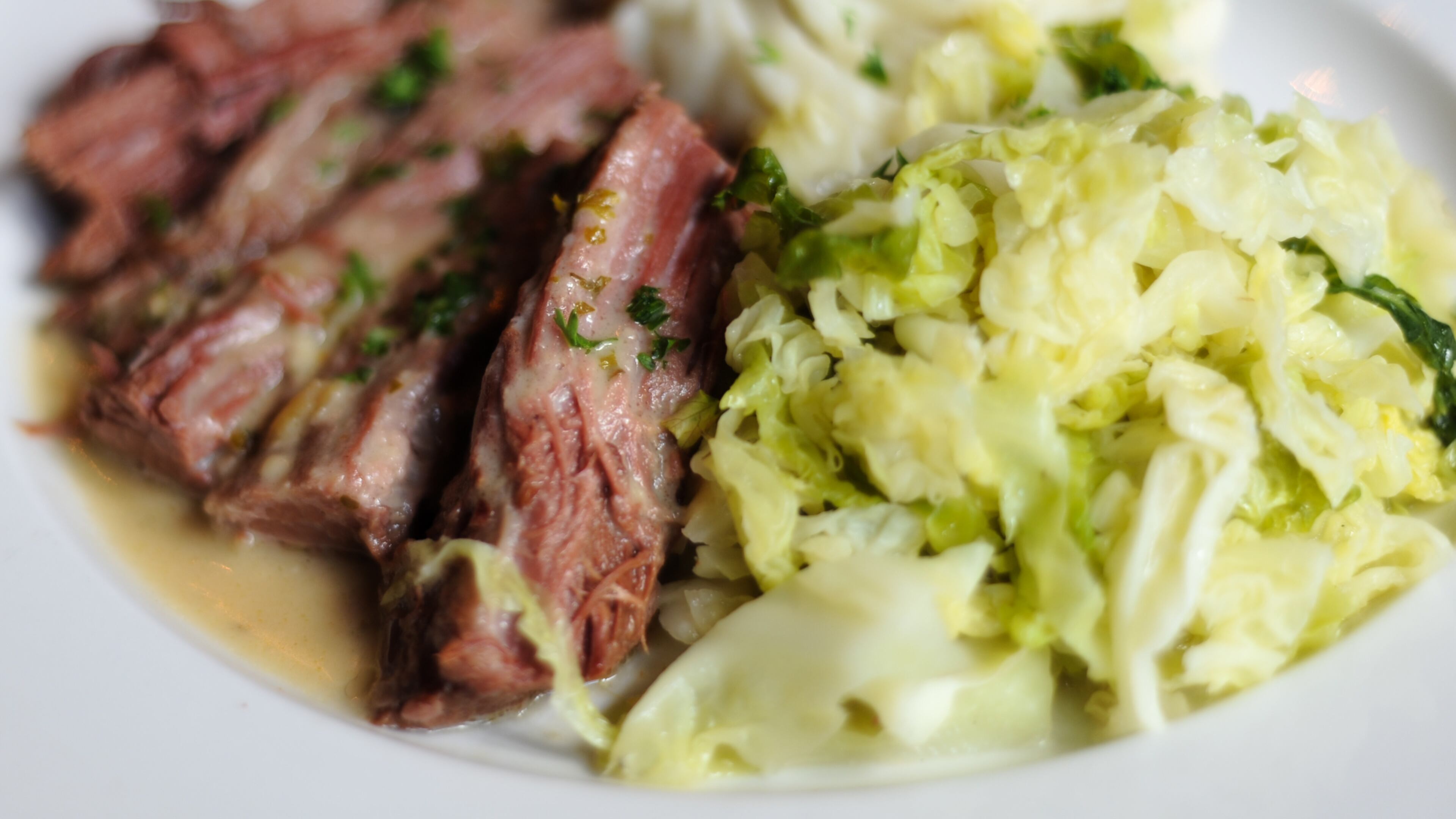 House-brined brisket shows up in several guises, including corned beef and cabbage.