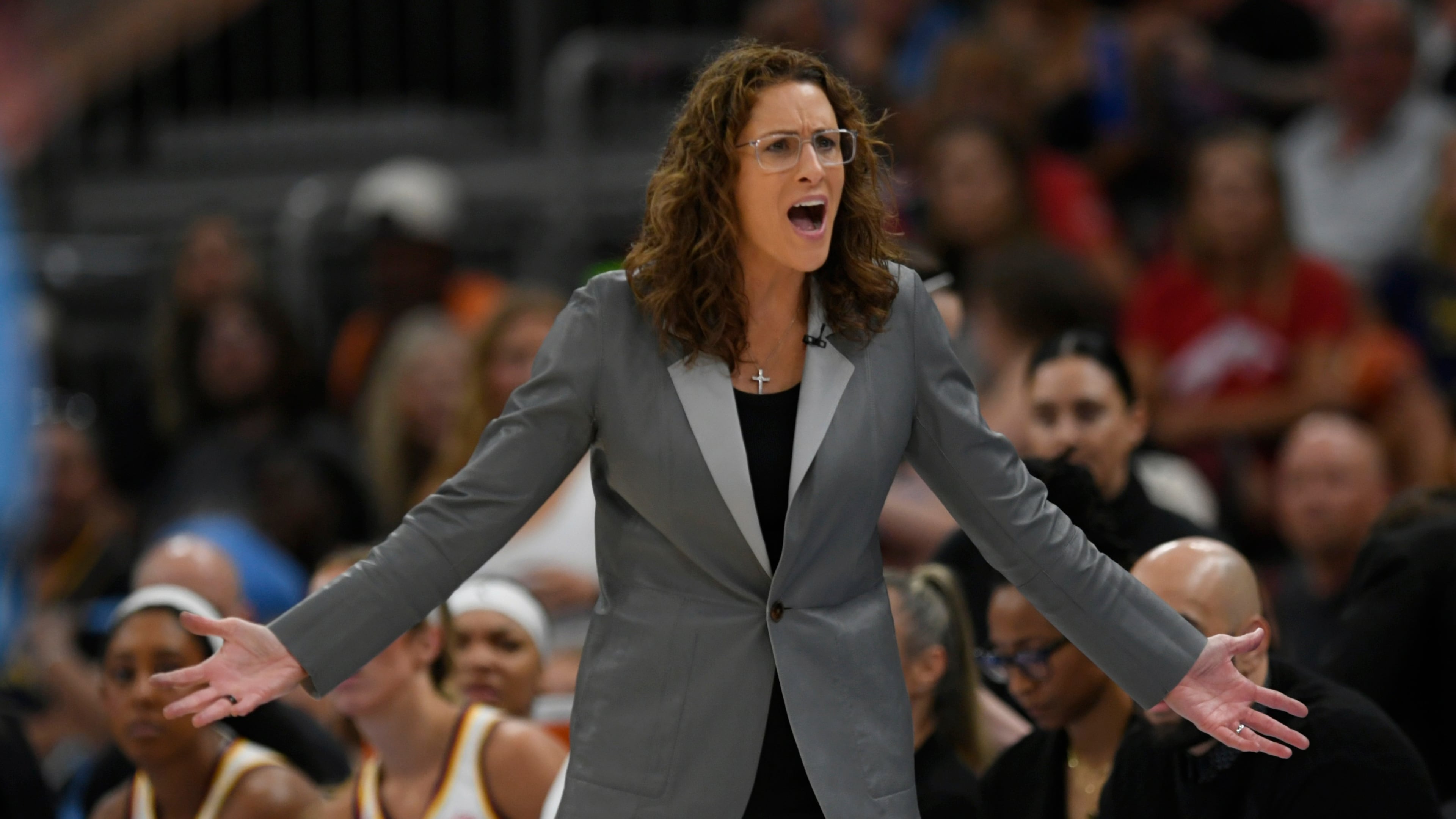 Indiana Fever head coach Stephanie White yells at referees after Caitlin Clark was called for a foul during the second half of a WNBA basketball game against the Chicago Sky in Chicago, Saturday, Aug. 8, 2026. (AP Photo/Paul Beaty)