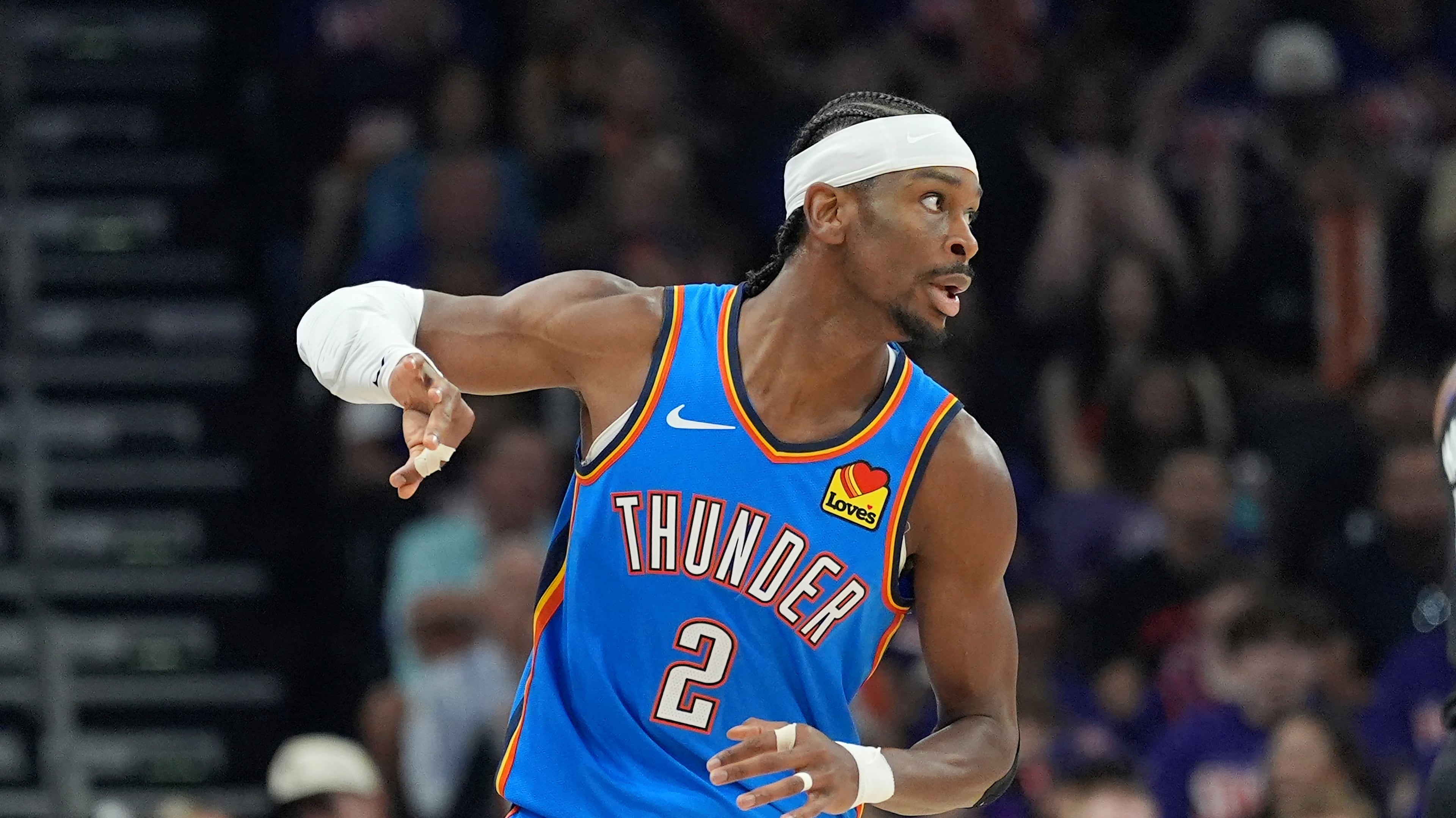 Oklahoma City Thunder guard Shai Gilgeous-Alexander celebrates a 3-pointer against the Phoenix Suns during the first half of Game 3 of a first-round NBA playoffs basketball series, Saturday, April 25, 2026, in Phoenix. (AP Photo/Ross D. Franklin)
