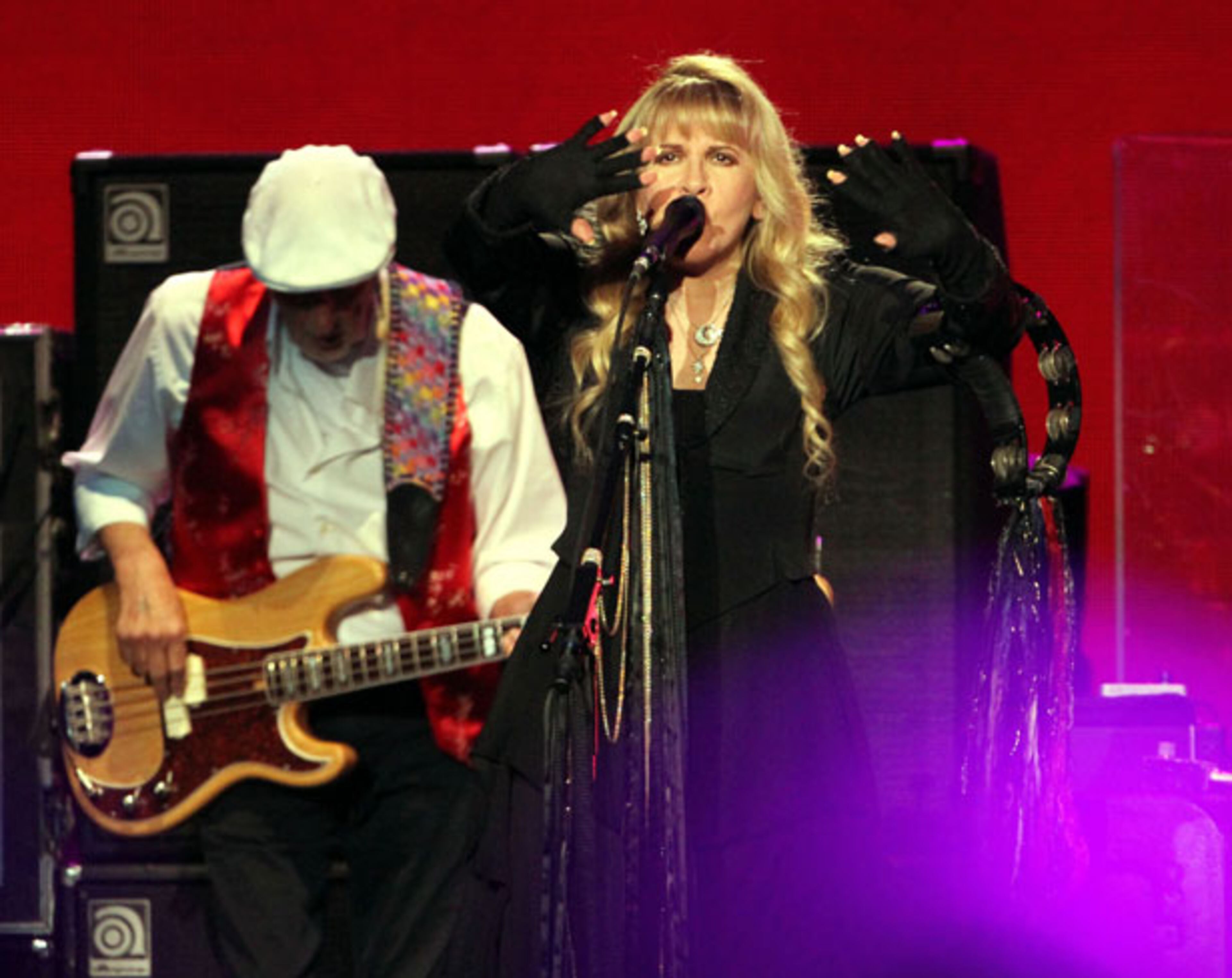 John McVie and Stevie Nicks perform during Fleetwood Mac's On With the Show tour stop at a sold-out Philips Arena in Atlanta Wednesday, Dec. 17, 2014. The tour marks the first time in 16 years that Stevie Nicks, Mick Fleetwood, Lindsey Buckingham and John McVie have toured with Christine McVie. Robb D. Cohen/RobbsPhotos.com Robb D. Cohen/RobbsPhotos.com