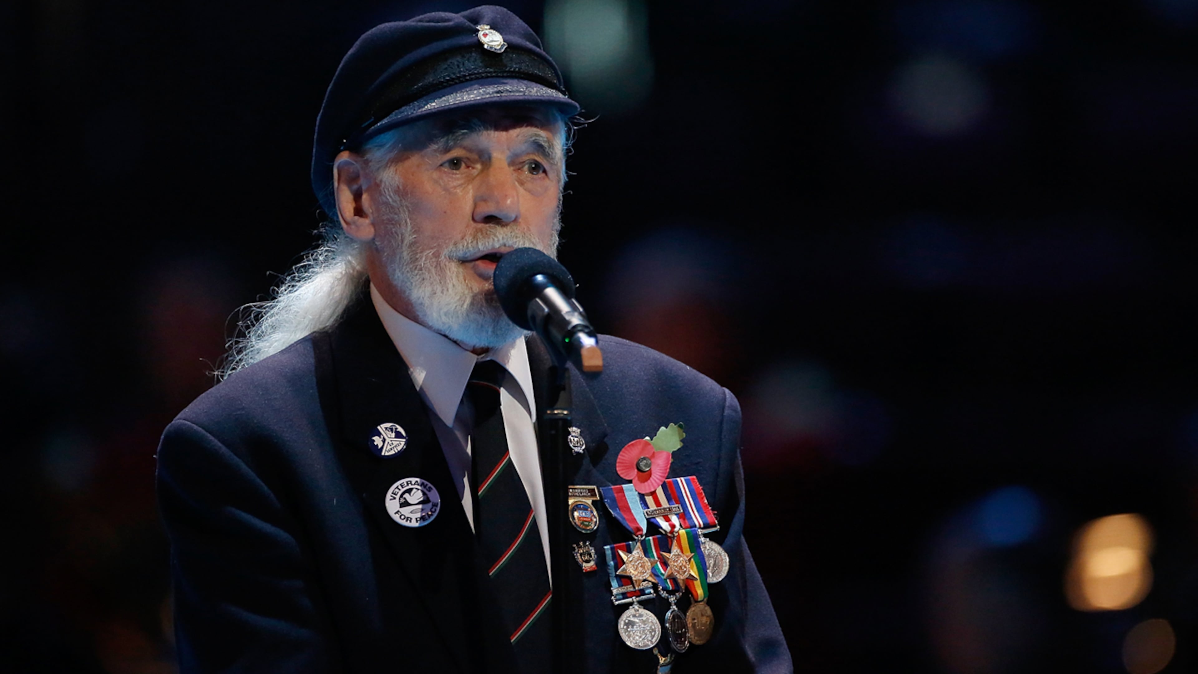 FILE PHOTO: Veteran Jim Radford speaks onstage during The Royal British Legion's Festival of Remembrance matinee performance at Royal Albert Hall on November 8, 2014, in London, England.