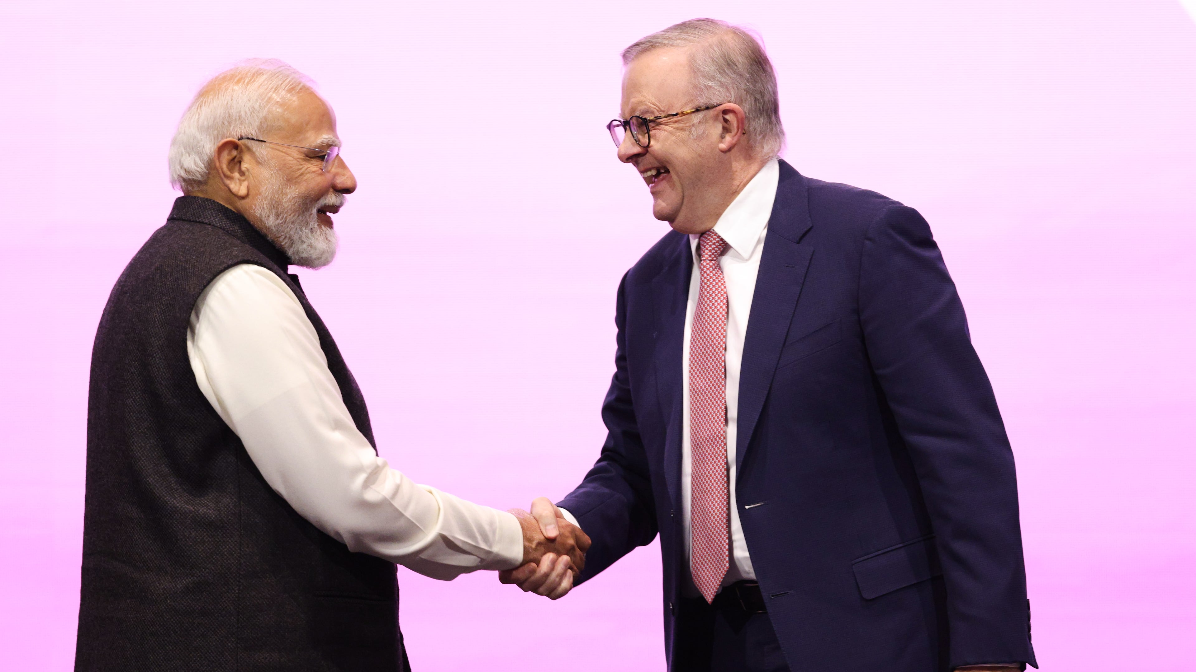 Indian Prime Minister Narendra Modi, left, is welcomed to the stage by Australian Prime Minister Anthony Albanese to address the Australia-India Economic Roadmap Business Reception in Melbourne, Australia, Thursday, July 9, 2026. (AP Photo/Hamish Blair)