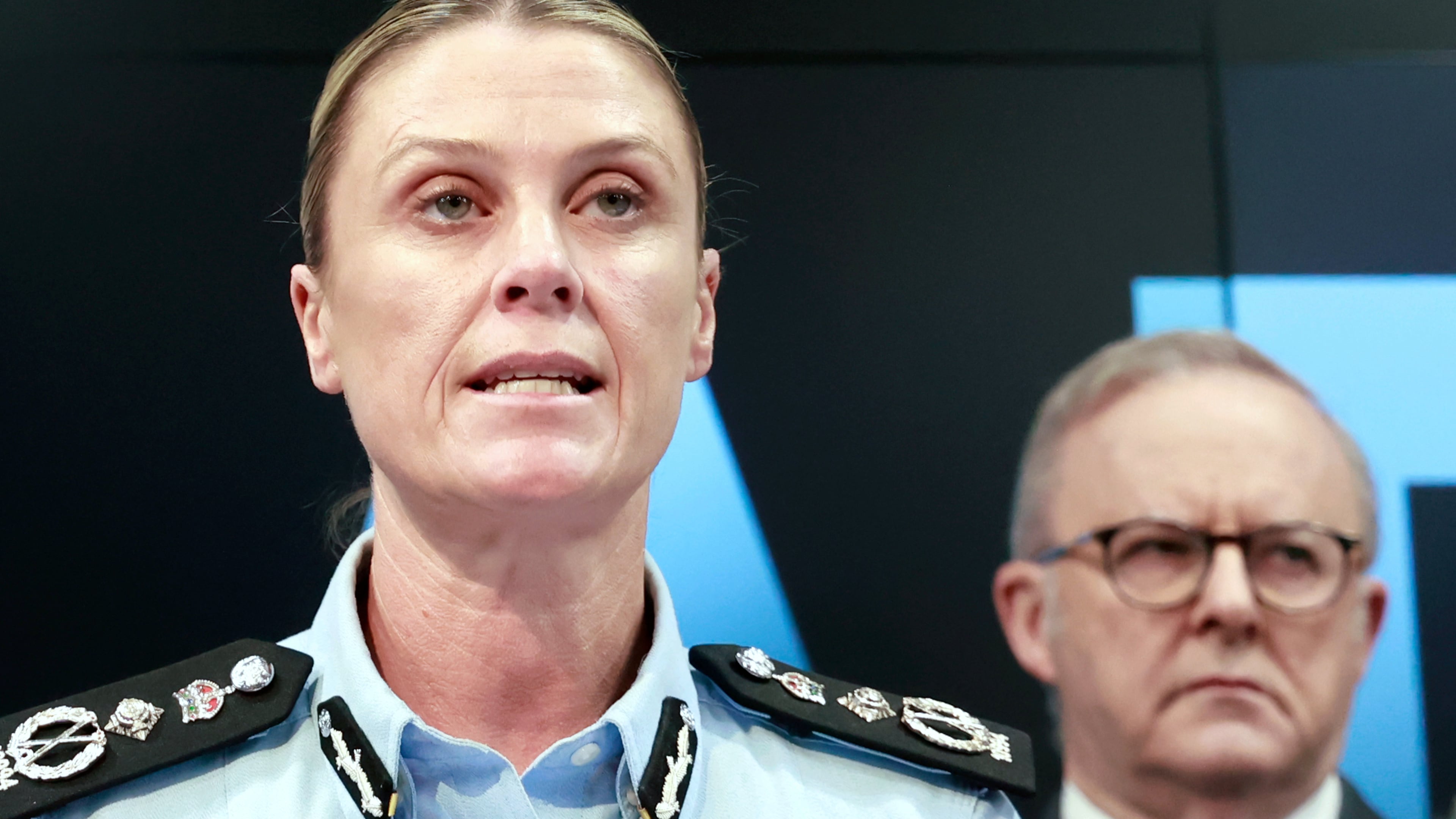 Australian Federal Police Commissioner Krissy Barrett speaks about the Bondi terror attack investigation as Prime Minister Anthony Albanese, right, listens, Tuesday, Dec. 30, 2025, in Canberra, Australia. (Hilary Wardhaugh/AAP Image via AP)