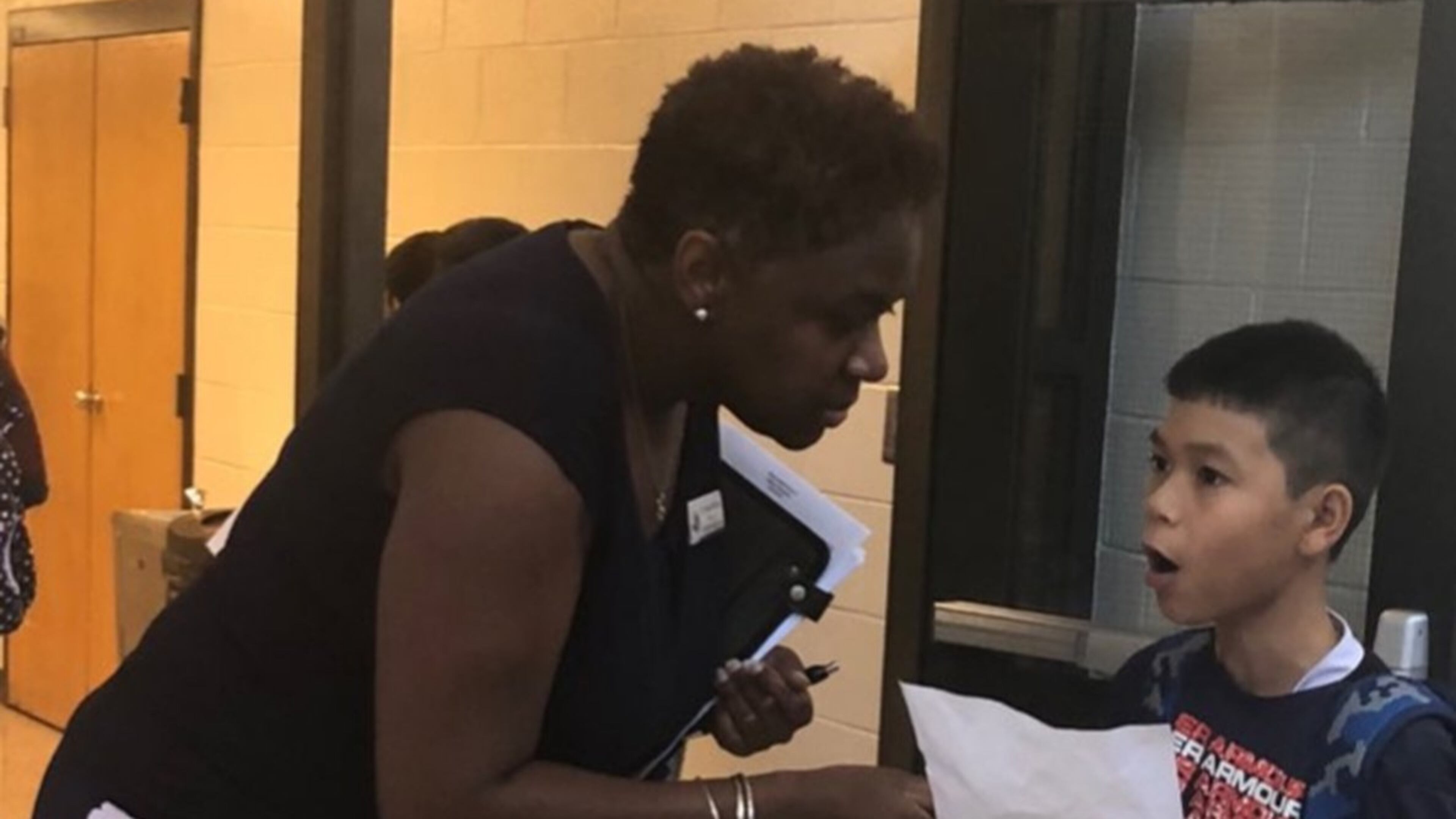 Tereka Williams, principal at Shiloh Middle Schools has a brief discussion with one of her students. Williams recently graduated from Gwinnett County Public School’s Aspiring Principal Program.
