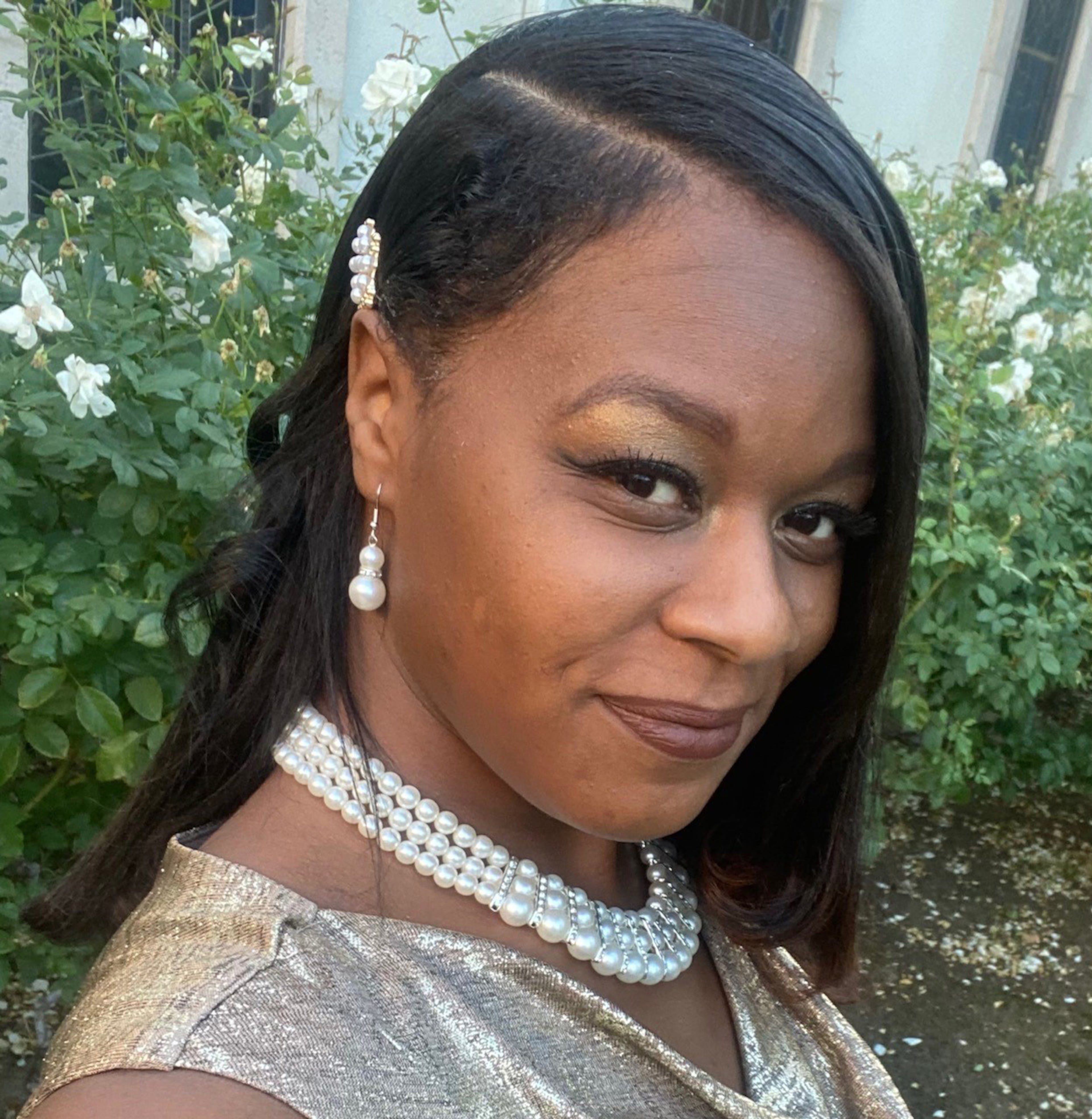 In July 2021, Angela Monroe-Wood heard nearby gunshots while she hosted a barbeque in her backyard. She and several partygoers called DeKalb 911 and they all got the same automated message instructing them to wait for the next available operator. COURTESY