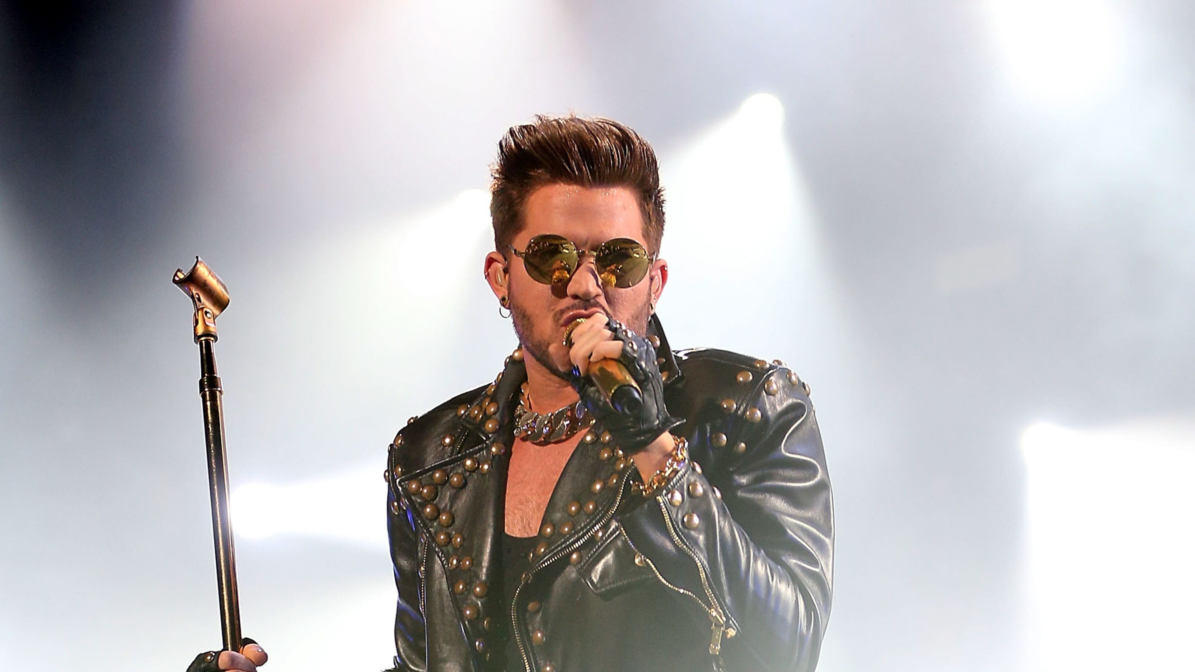 SYDNEY, AUSTRALIA - AUGUST 26: Adam Lambert performs on stage with QUEEN during QUEEN'S first tour of Australia since 1985 at Allphones Arena on August 26, 2014 in Sydney, Australia. (Photo by Mark Metcalfe/Getty Images) SYDNEY, AUSTRALIA - AUGUST 26: Adam Lambert, looking a bit like George Michael circa 1988, performs on stage with QUEEN during QUEEN'S first tour of Australia since 1985 at Allphones Arena on August 26, 2014 in Sydney, Australia. (Photo by Mark Metcalfe/Getty Images)