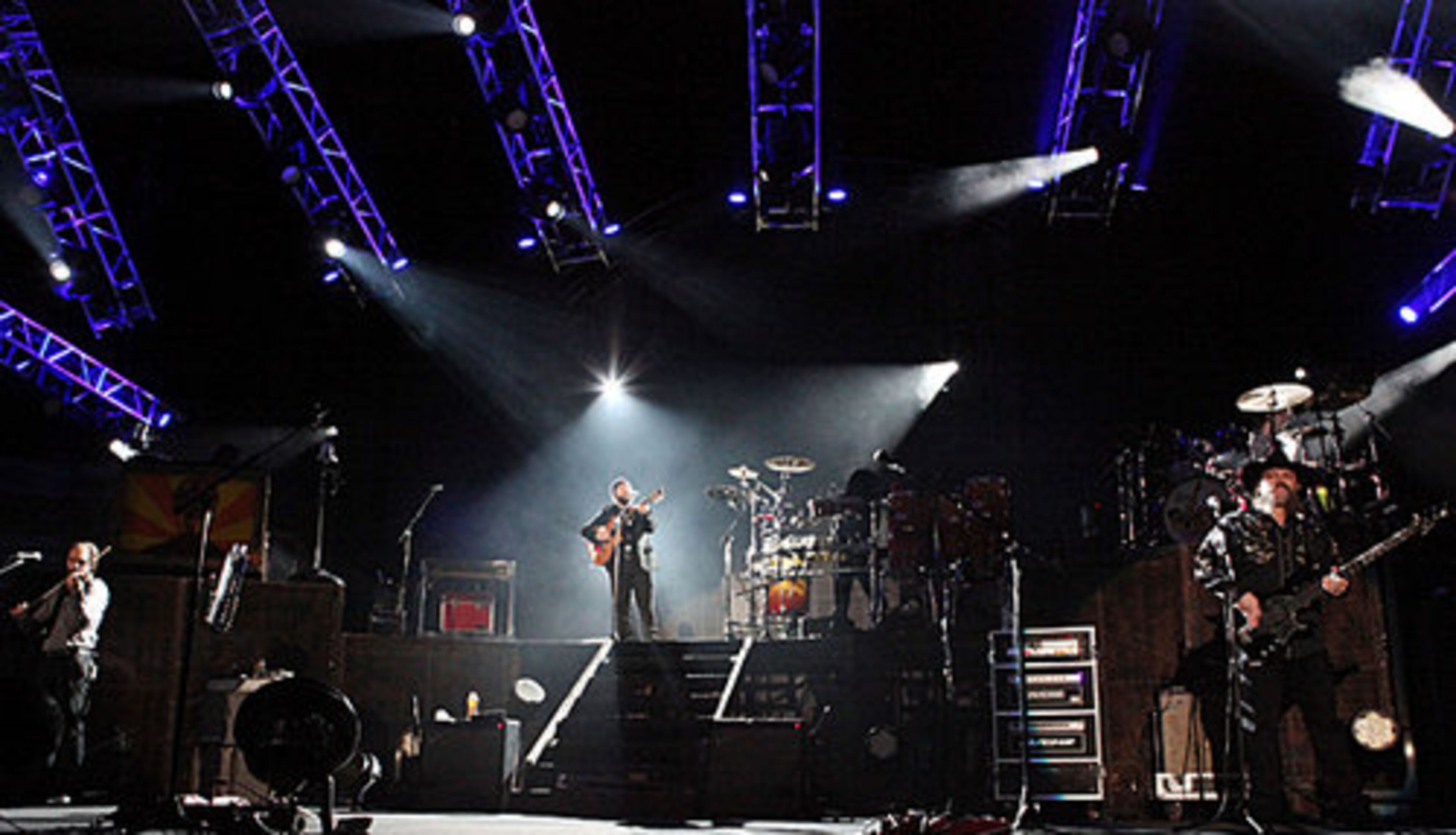 Zac Brown and the Zac Brown Band perform under purple lights to a spirited sold-out crowd Saturday night at Philips Arena.