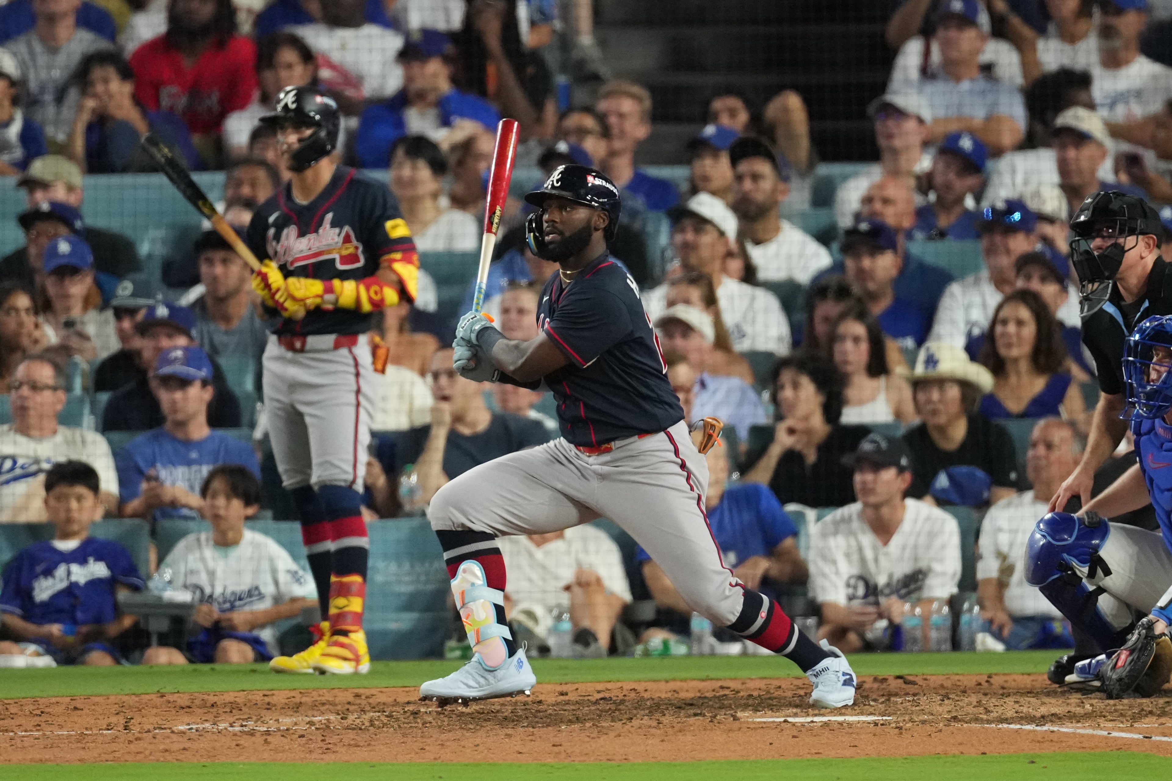 Atlanta Braves' Michael Harris II celebrates after hitting an RBI double during the seventh inning of Game 2 of a National League Division Series baseball game against the Los Angeles Dodgers Sunday, Oct. 4, 2026, in Los Angeles. (AP Photo/Jae C. Hong)