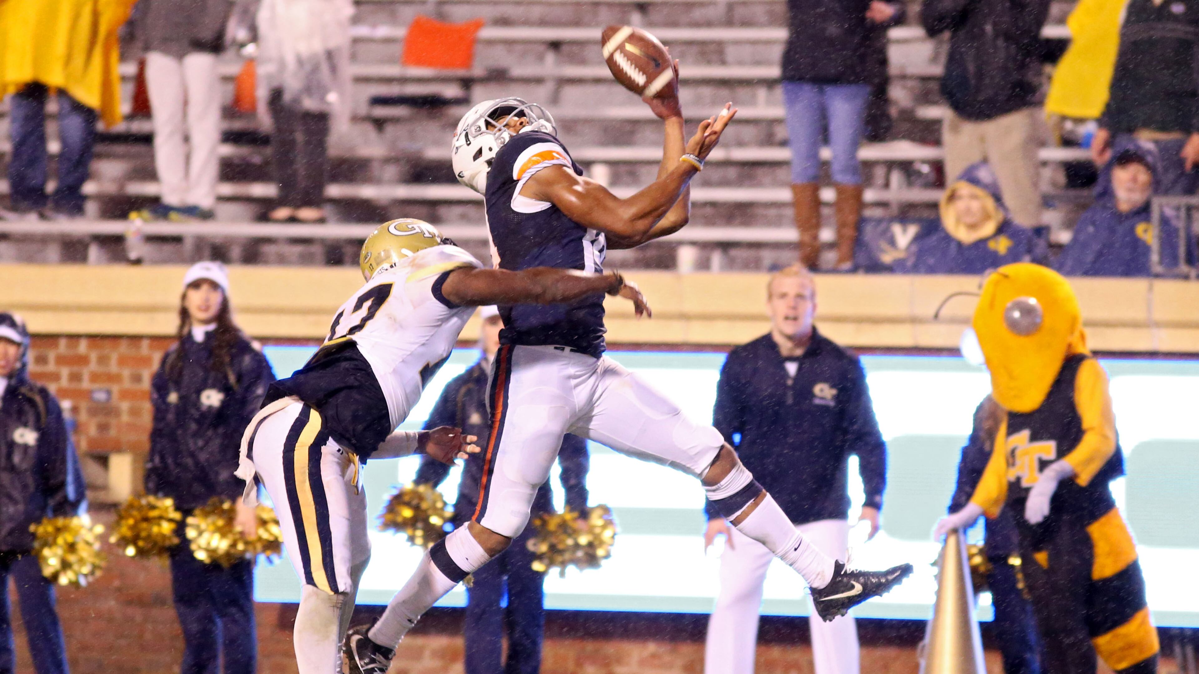 Virginia's Andre Levrone catches would was the winning touchdown pass over Georgia Tech's Lance Austin late in the fourth quarter Saturday. (Ryan M. Kelly/Getty Images)