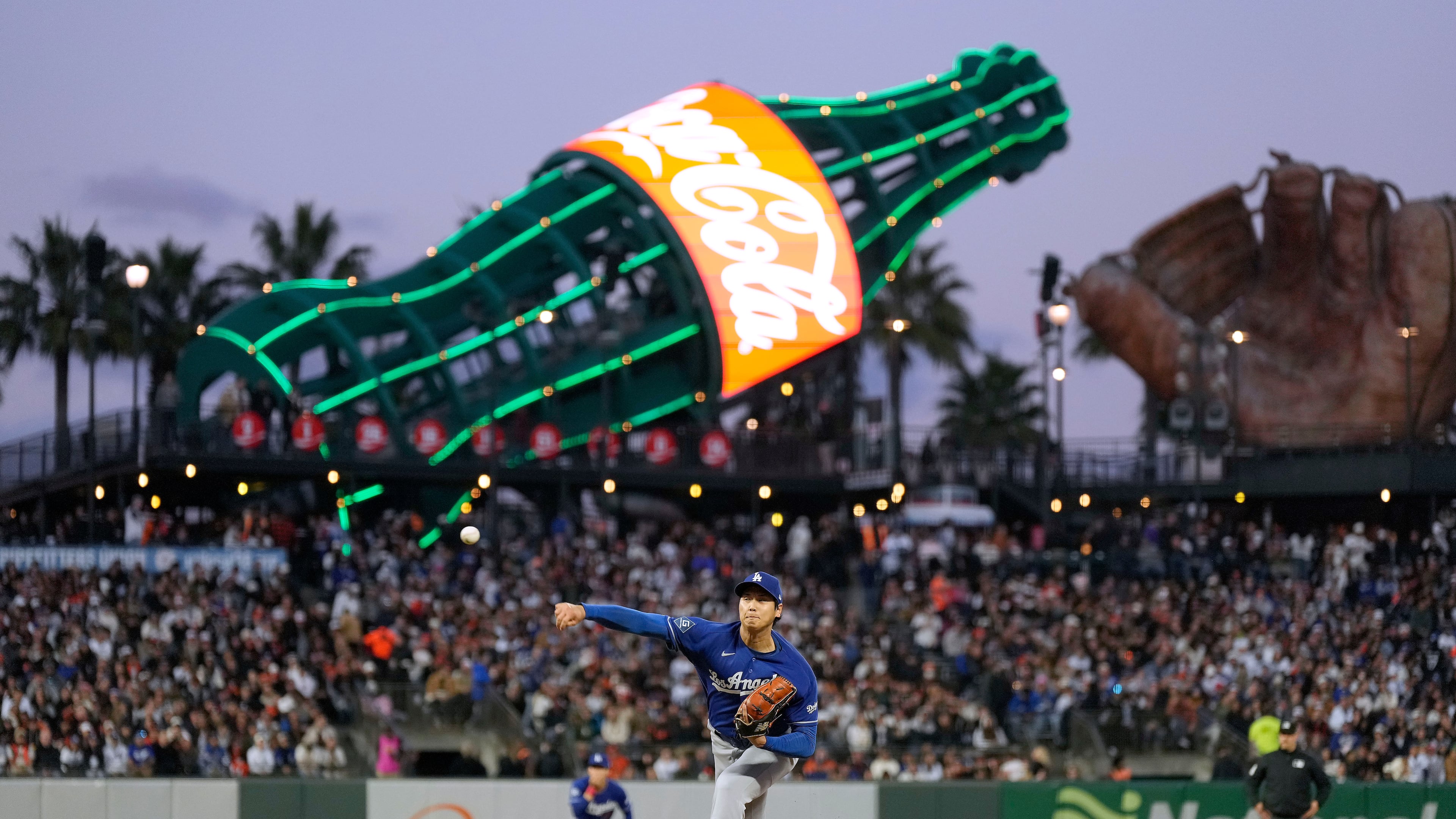 Los Angeles Dodgers pitcher Shohei Ohtani throws to a San Francisco Giants batter during the fifth inning of a baseball game Wednesday, April 22, 2026, in San Francisco. (AP Photo/Tony Avelar)